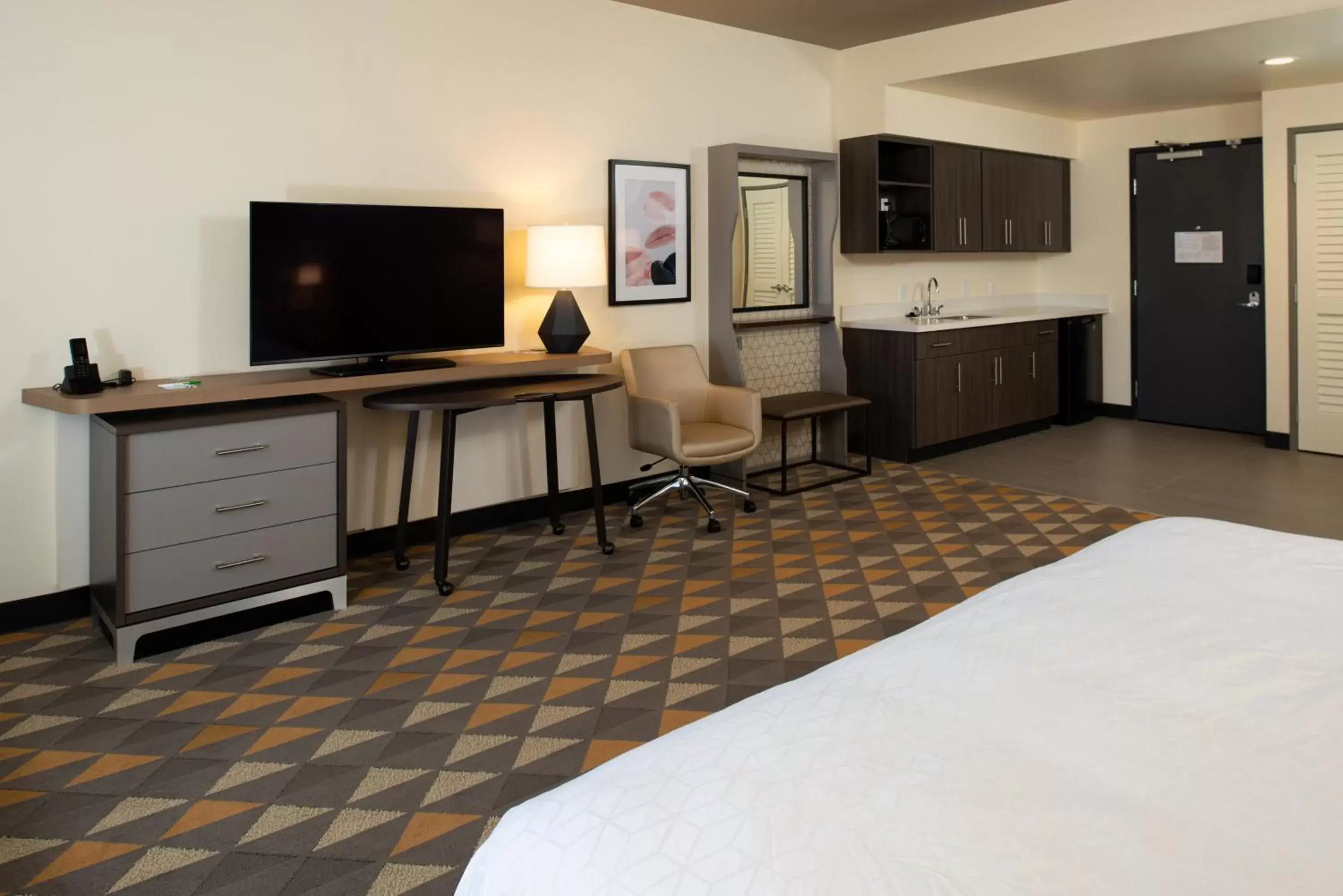 Photo of the whole room, TV/Entertainment Center in Holiday Inn & Suites - Idaho Falls, an IHG Hotel