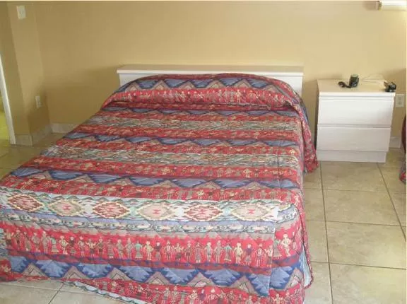 Bed in Miami Princess Hotel