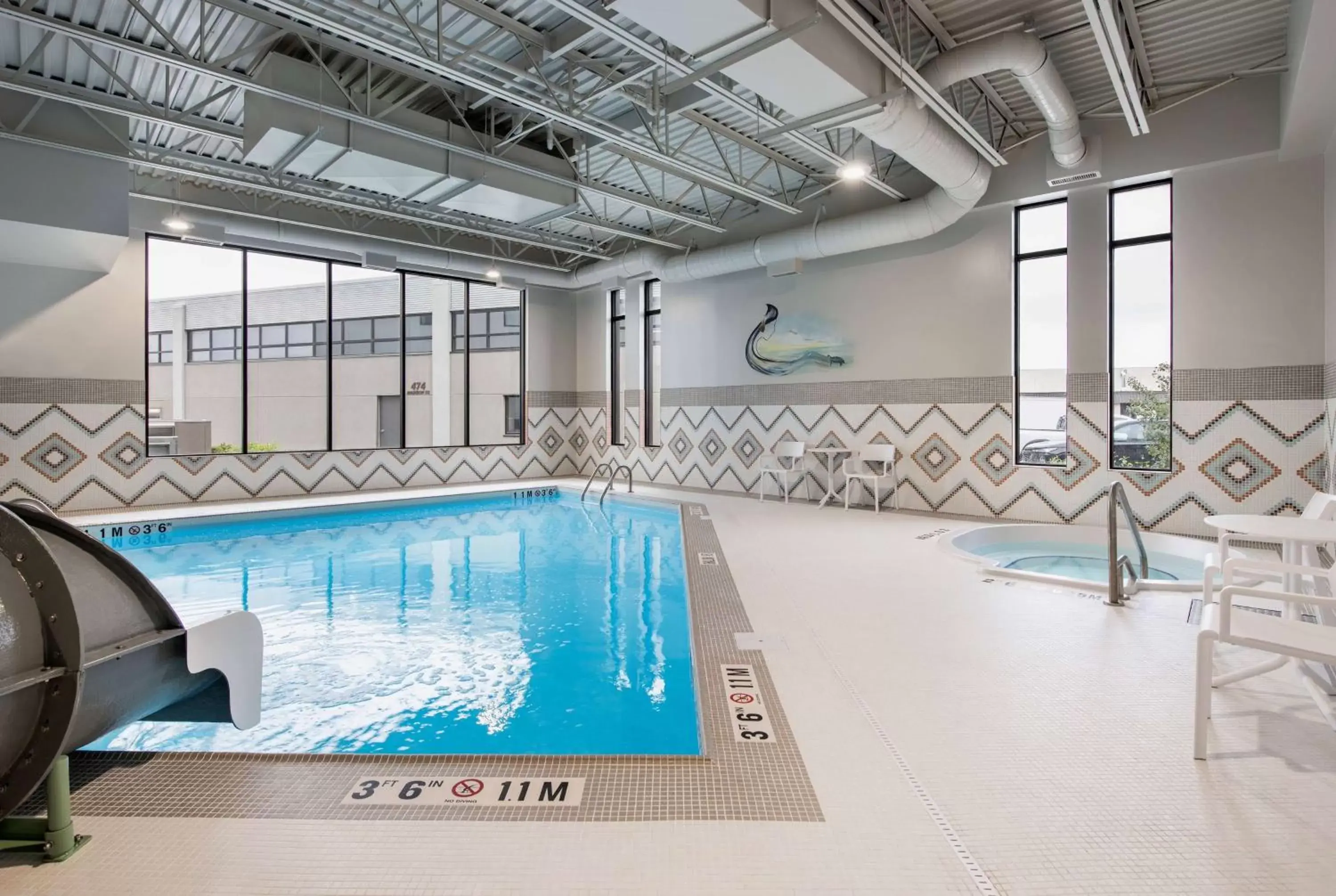 Pool view, Swimming Pool in Wyndham Garden Winnipeg Airport