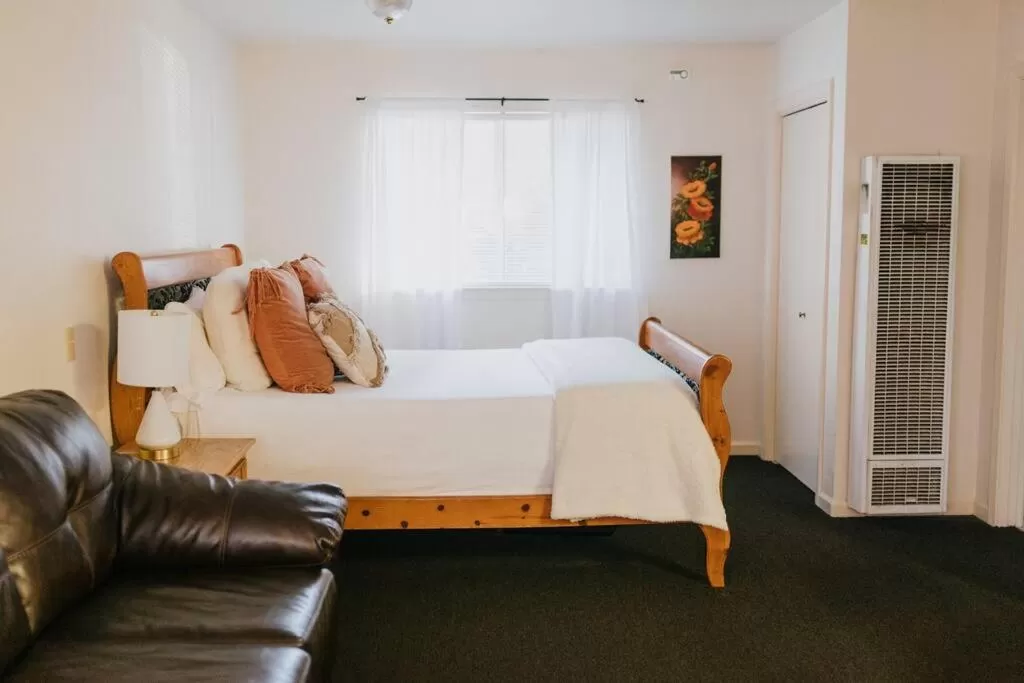 Bed in The Long Barn Lodge