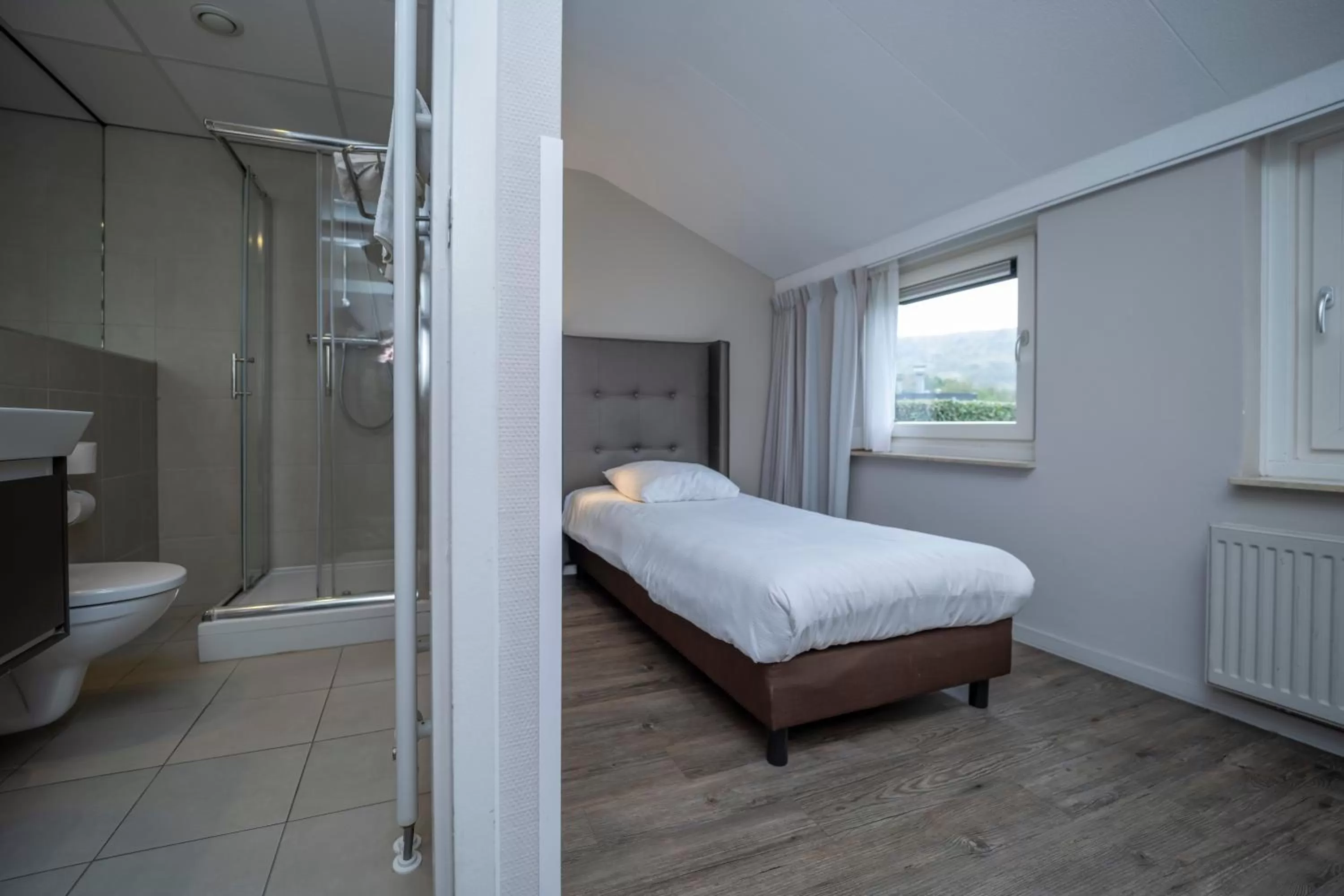 Bed in Fletcher Zuiderduin Beachhotel