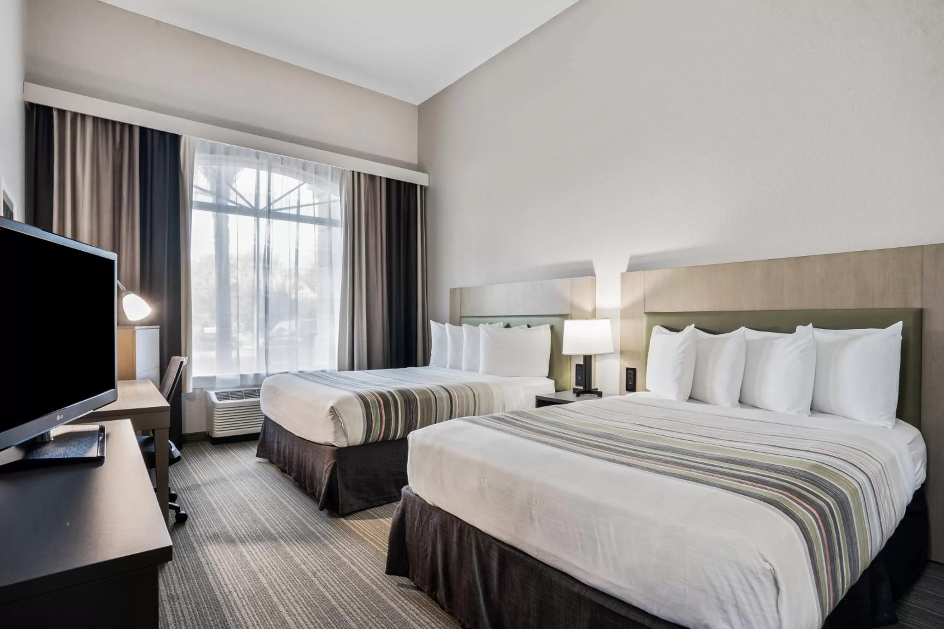 Bedroom, Bed in Country Inn & Suites by Radisson, Port Canaveral, FL