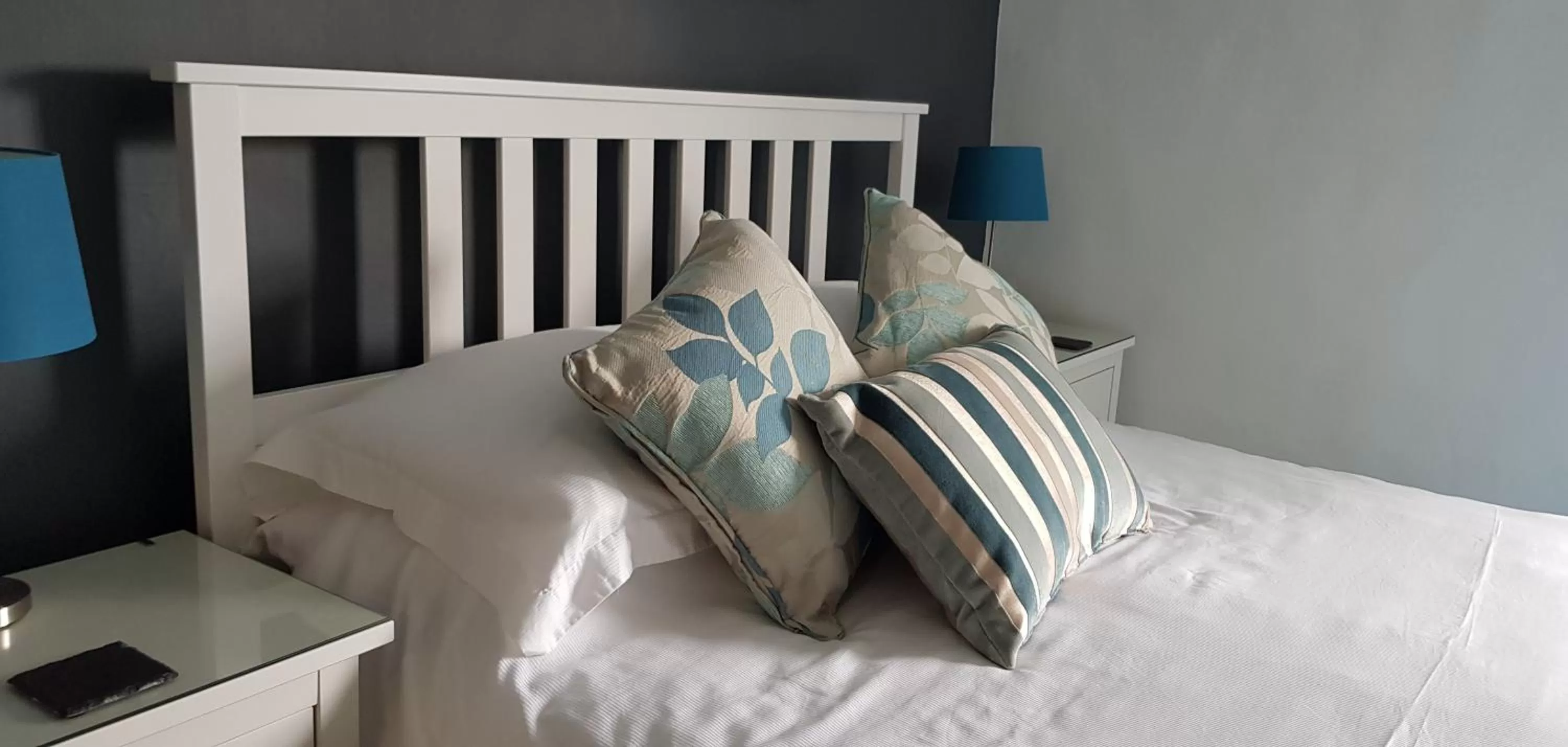 Bed in The Greyhound Inn