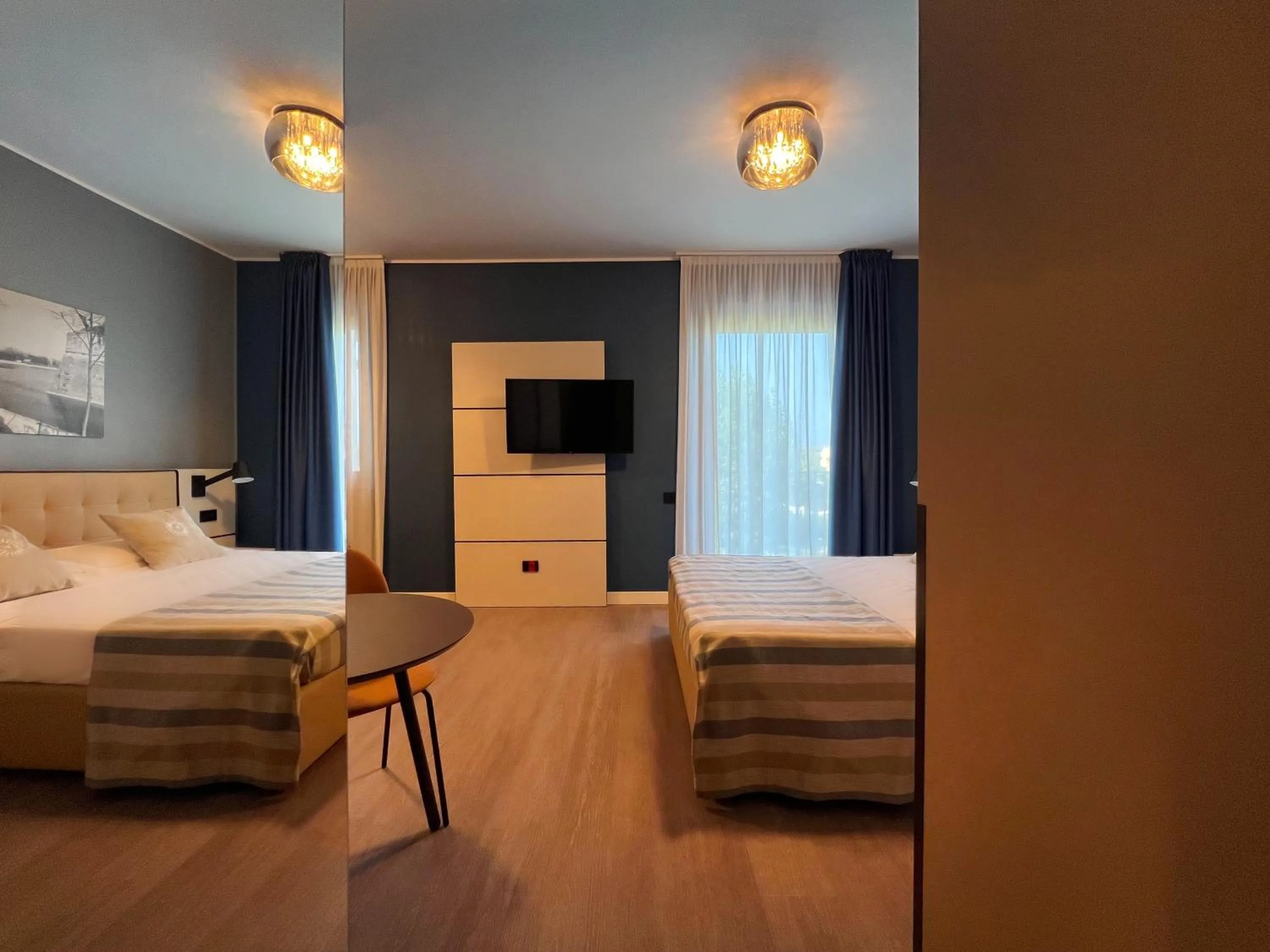 Bed in Hotel Puccini