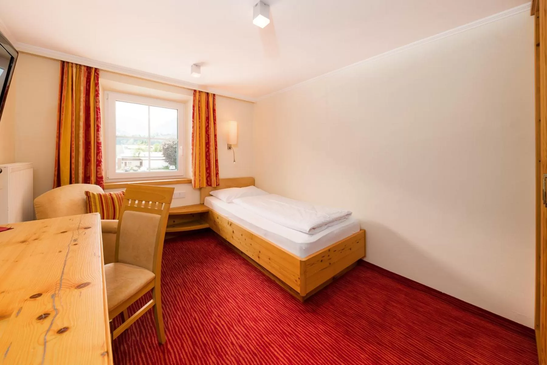 Photo of the whole room, Bed in Hotel Bräurup