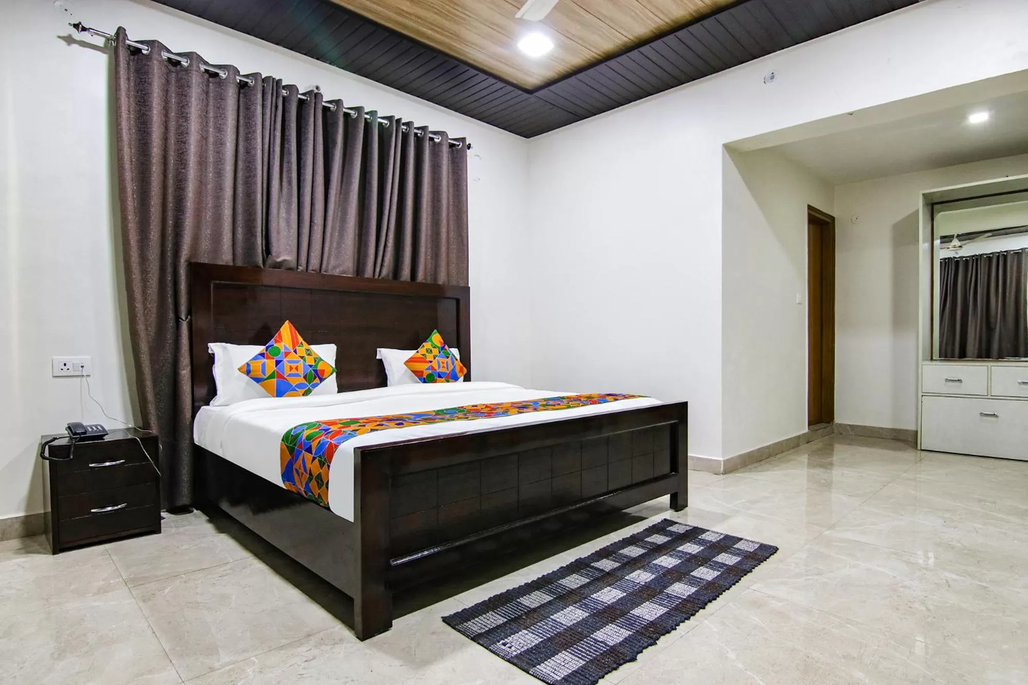 Living room, Bed in FabHotel Prime Olive Lake View