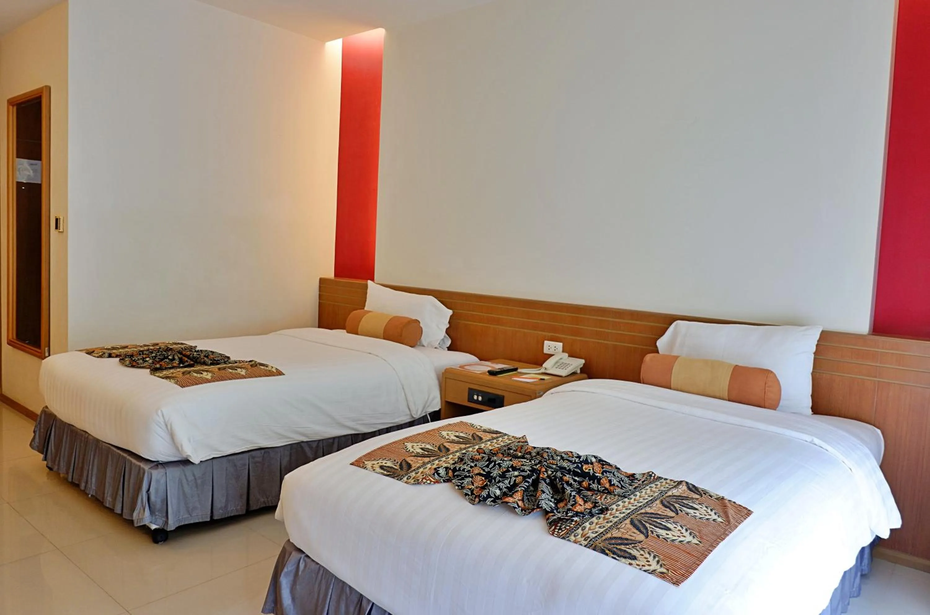 Bed in Tinidee Golf Resort Phuket