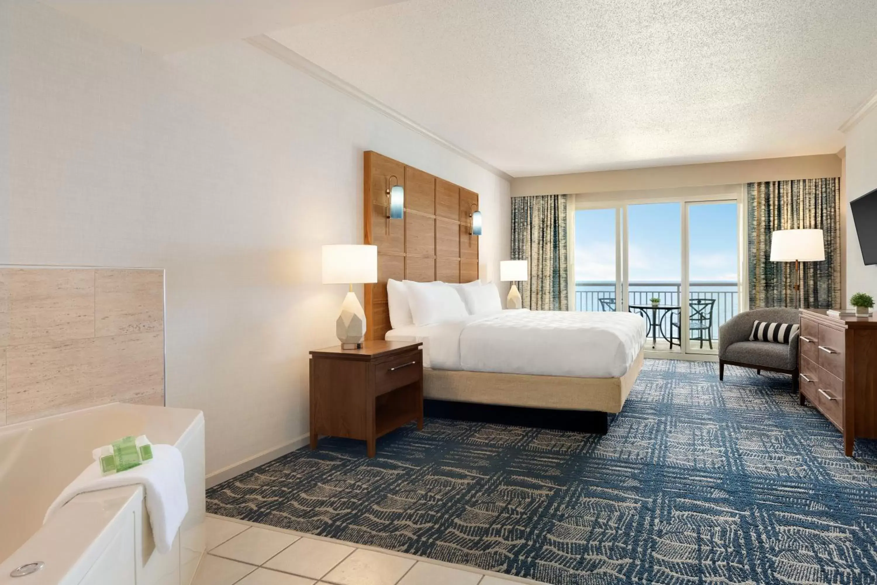 Bedroom, Bed in Holiday Inn & Suites Ocean City, an IHG Hotel