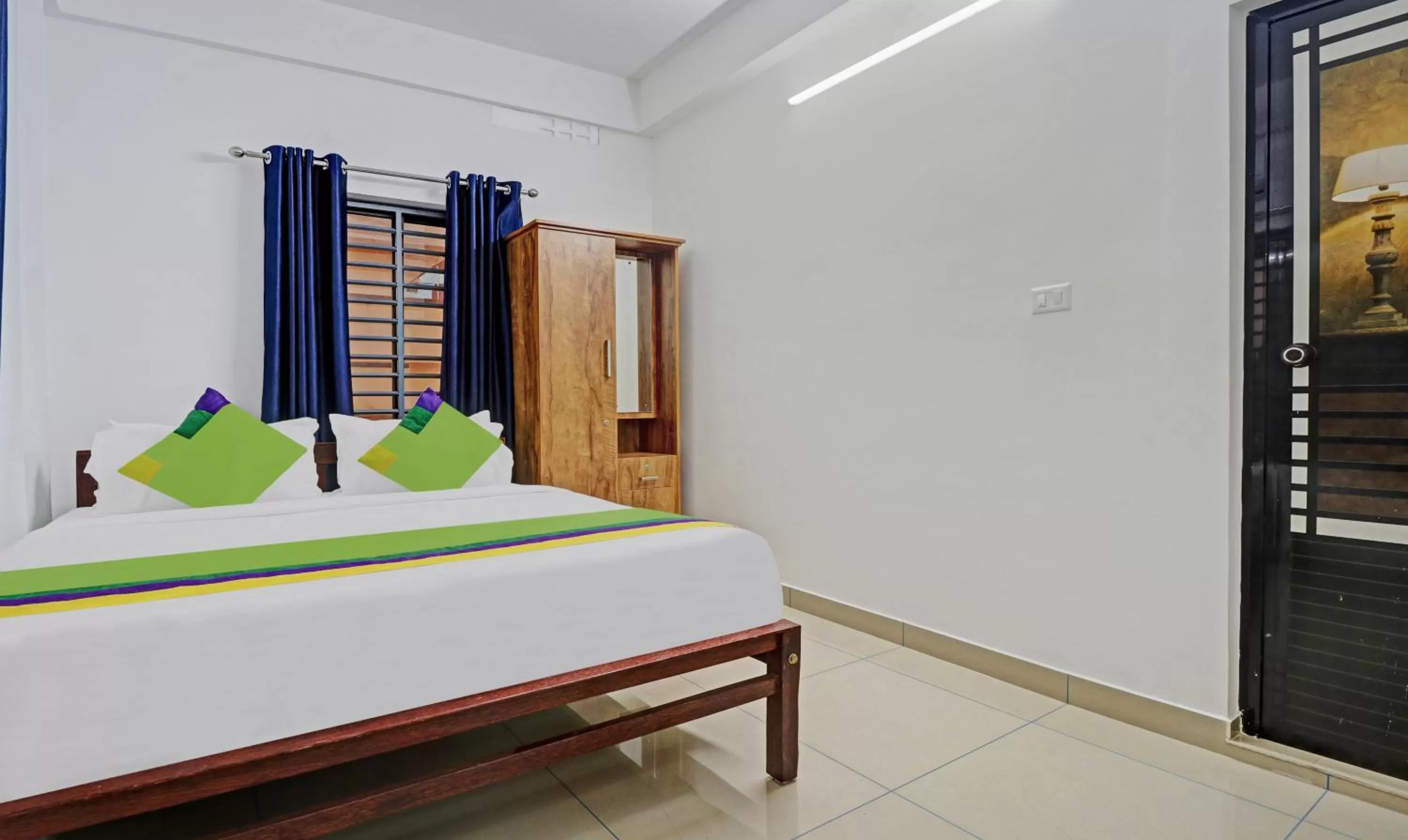 Bedroom, Bed in Treebo Trend Nirupama Apartment