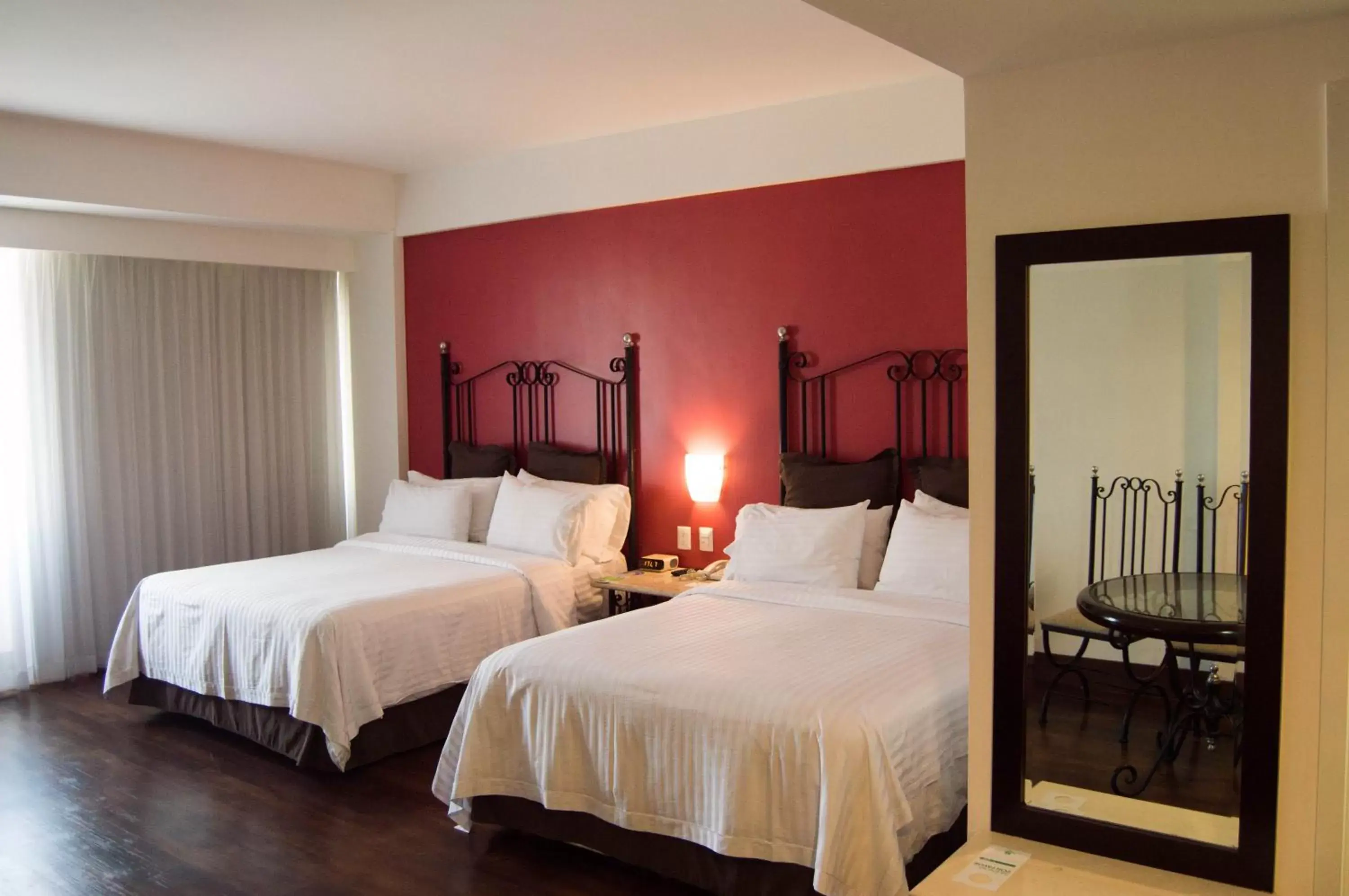 Photo of the whole room, Bed in Holiday Inn Hotel & Suites Centro Historico, an IHG Hotel