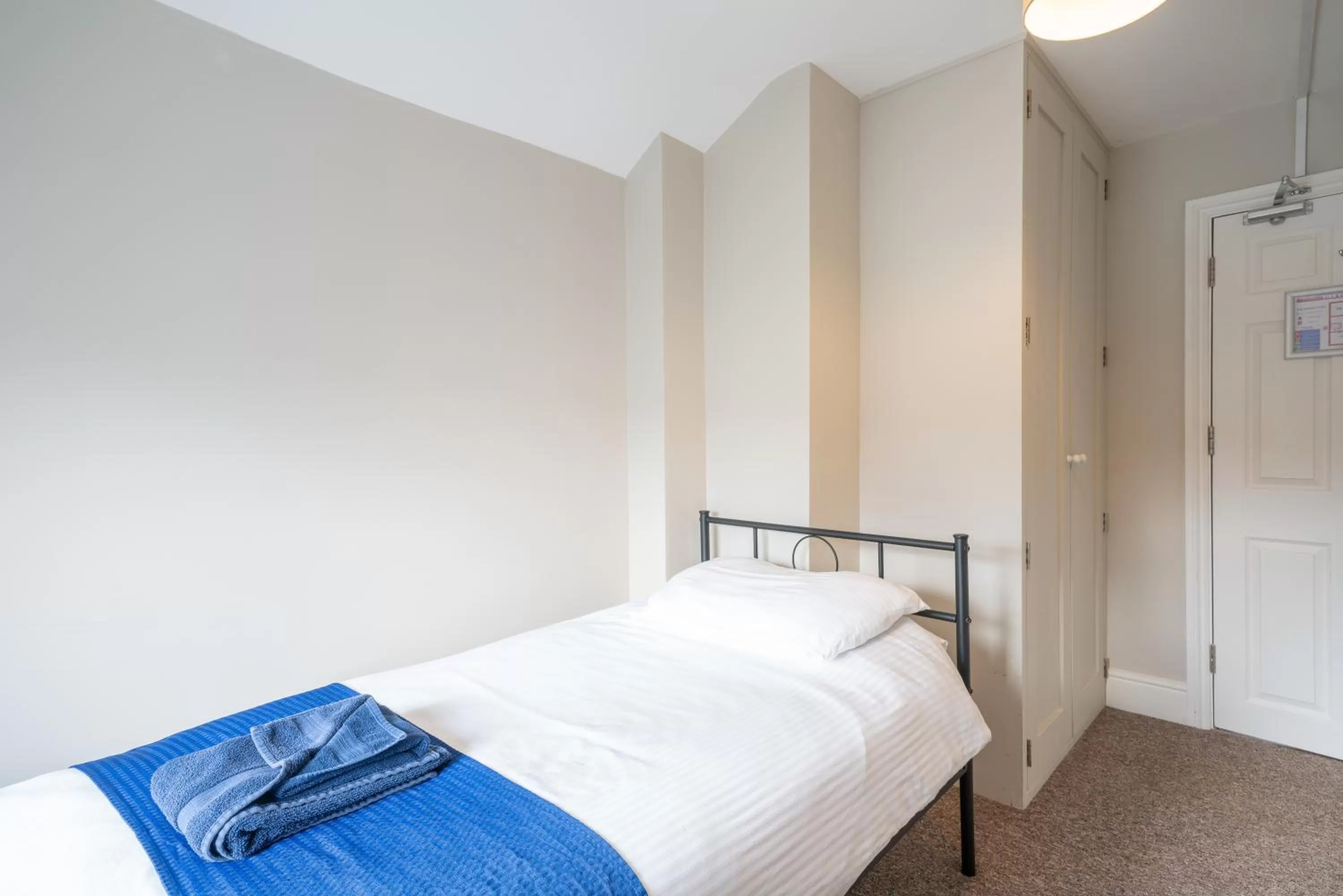 Bed in The Veteran Hotel & Bar