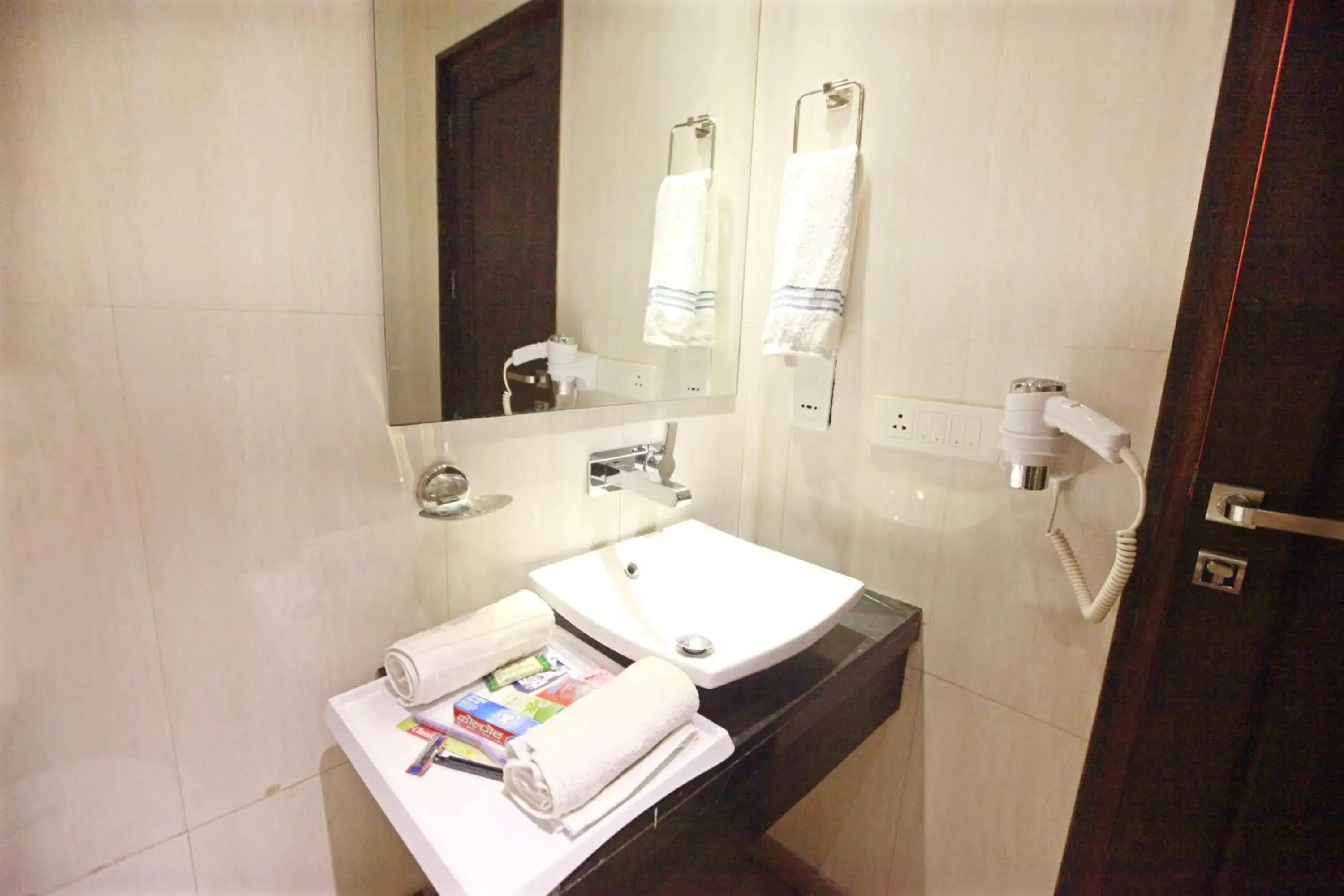 Bathroom in Hotel Krishna Deluxe-By RCG Hotels