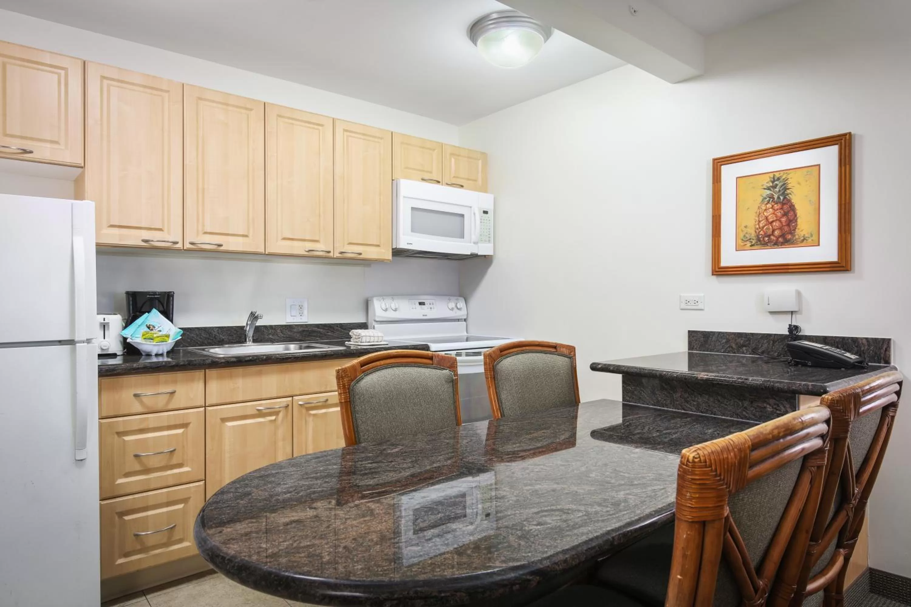 Kitchen or kitchenette in Aston Waikiki Sunset