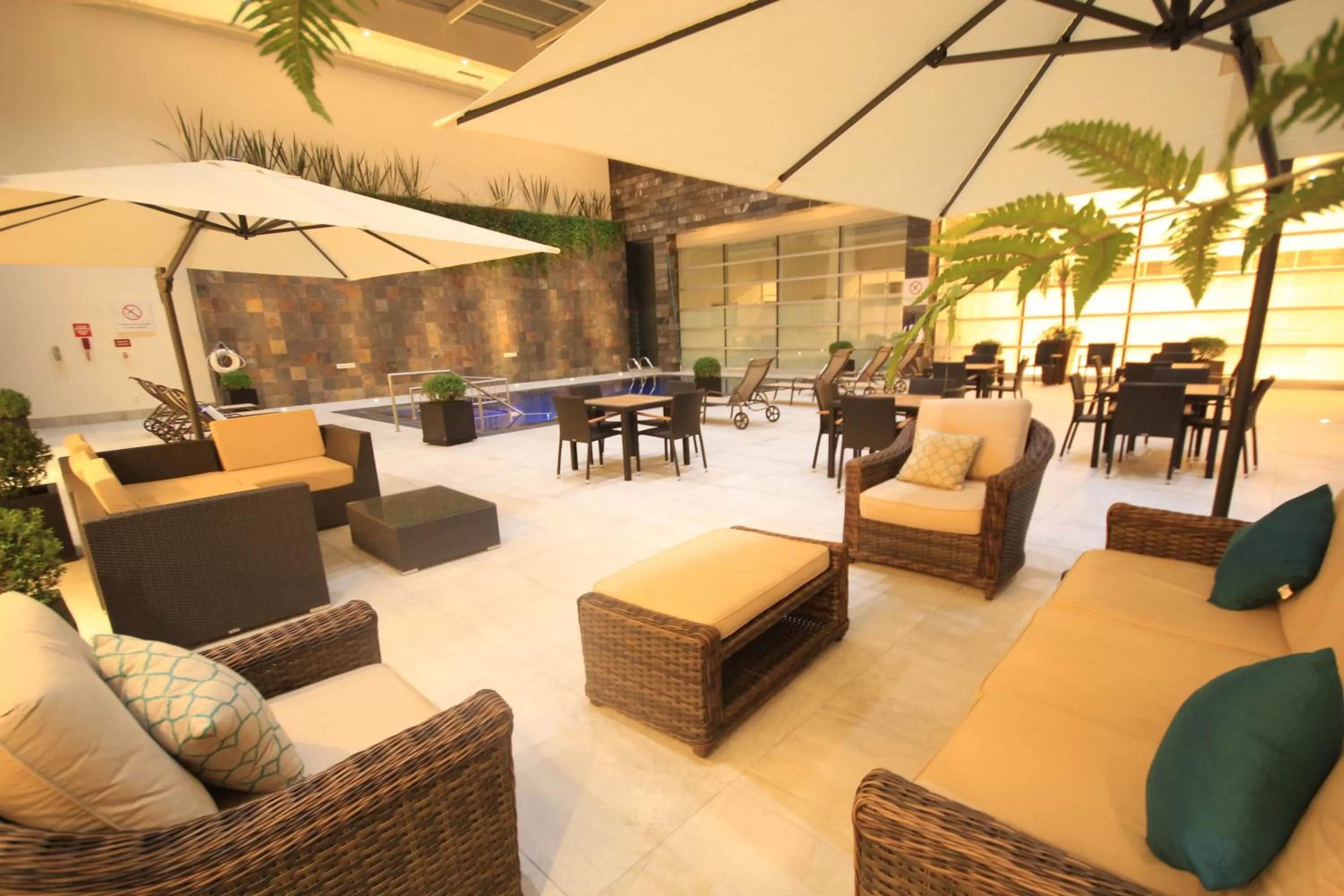 Swimming pool in Holiday Inn & Suites Plaza Mayor by IHG