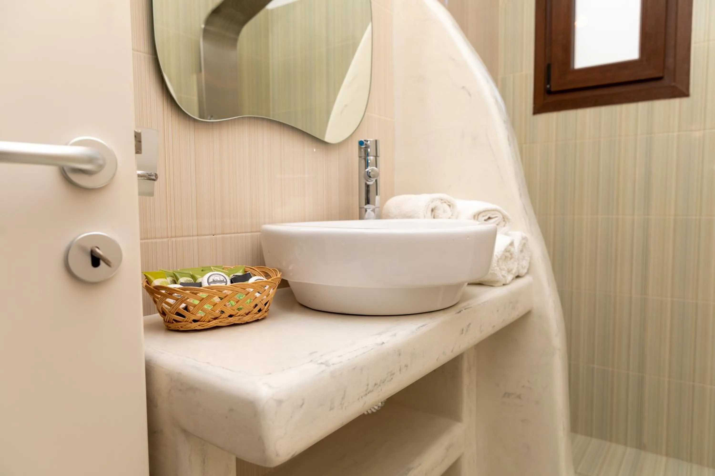 Bathroom in Depis Place and Apartments