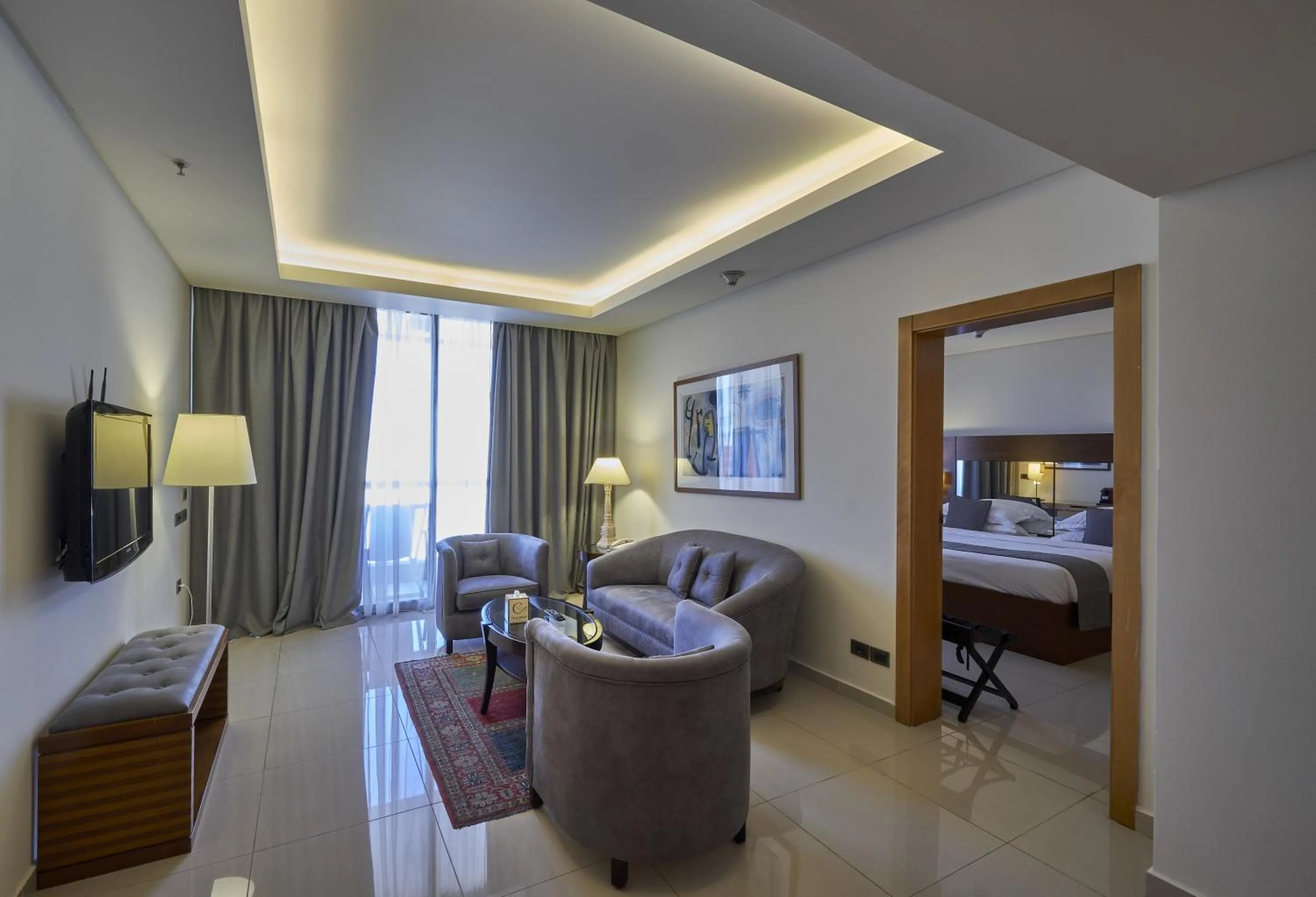 Living room, Bed in Coral Beach Hotel And Resort Beirut