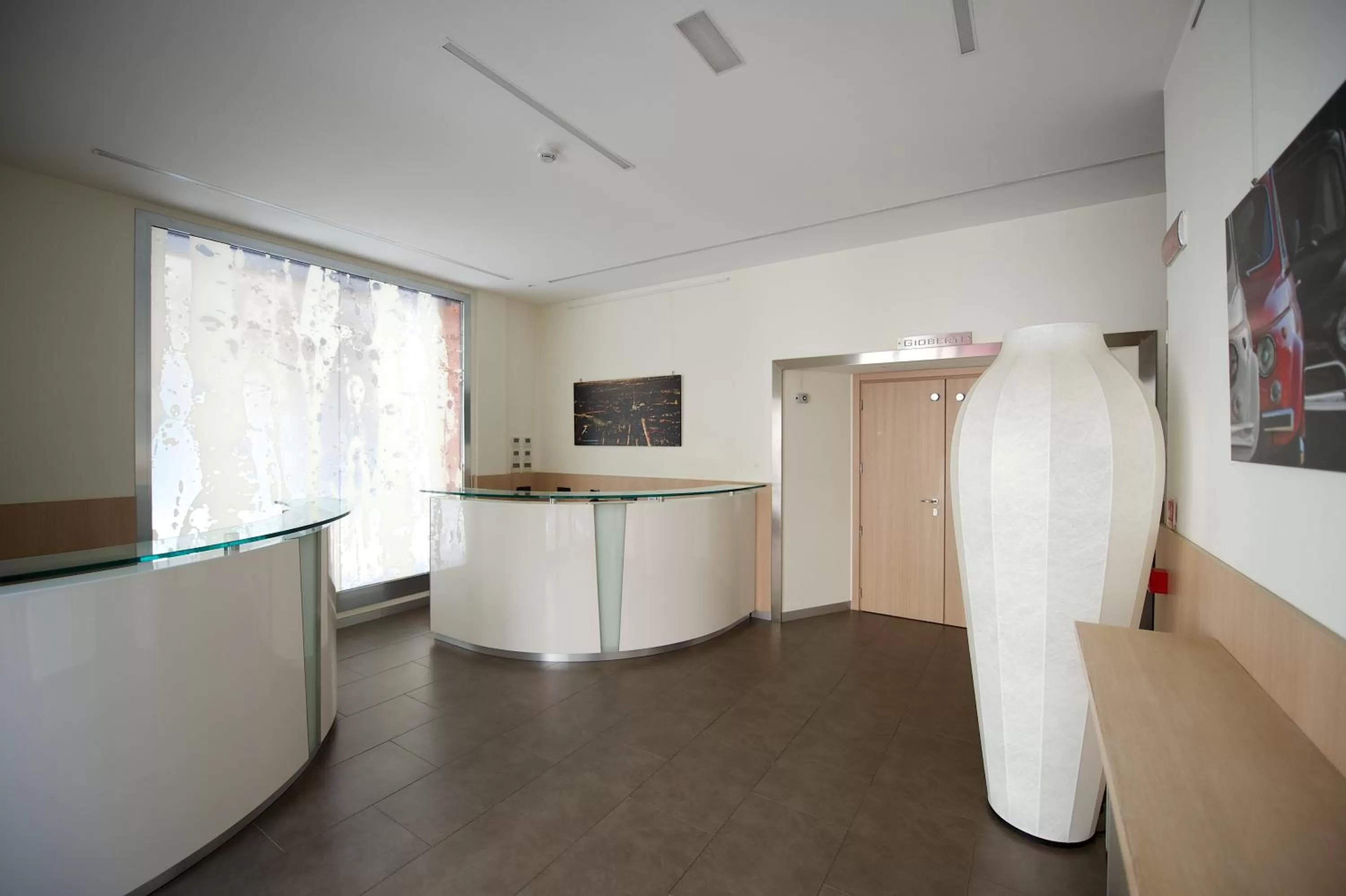 Communal lounge/ TV room in Best Western Hotel Luxor