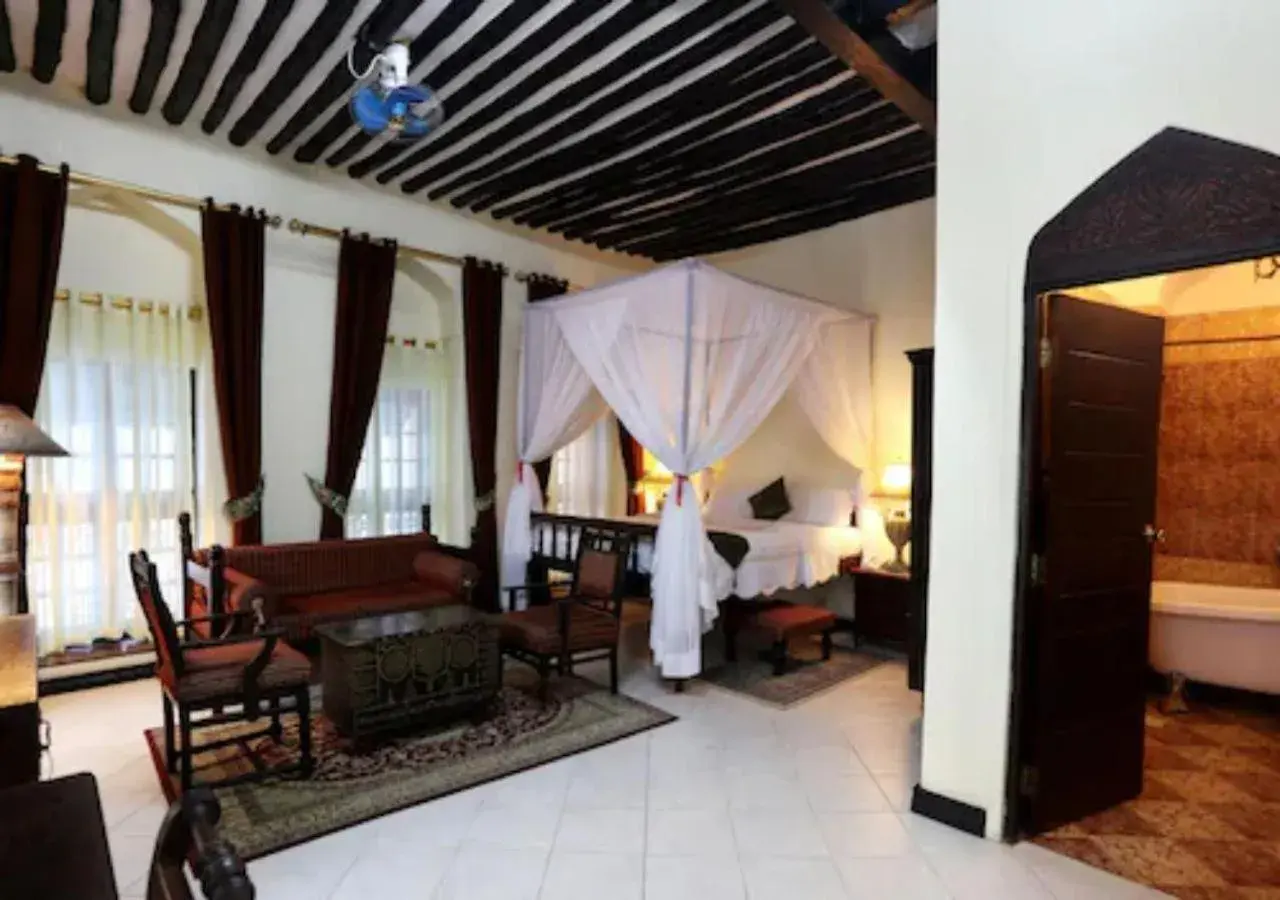 Bedroom, Seating Area in Africa House Zanzibar