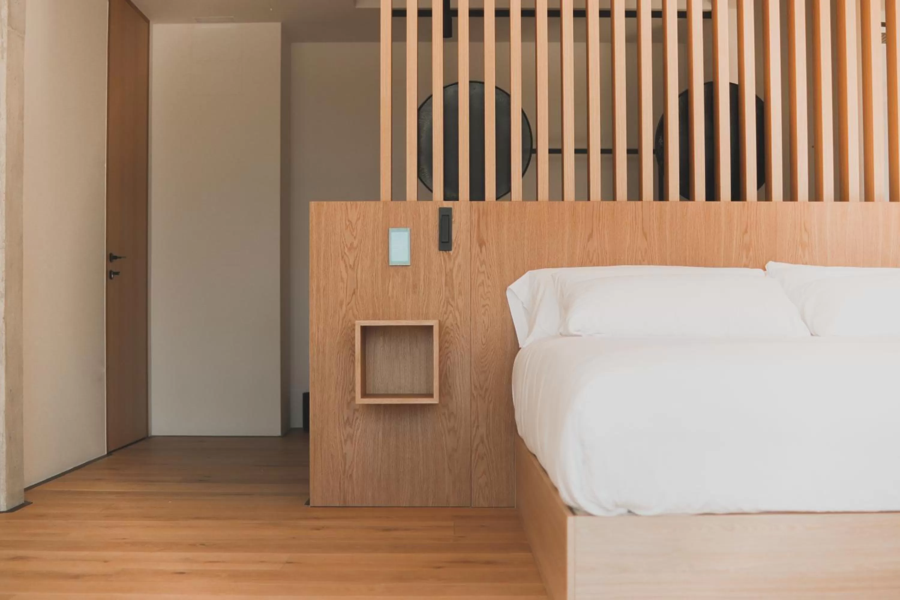 Bed in Atmos Hotel Boutique