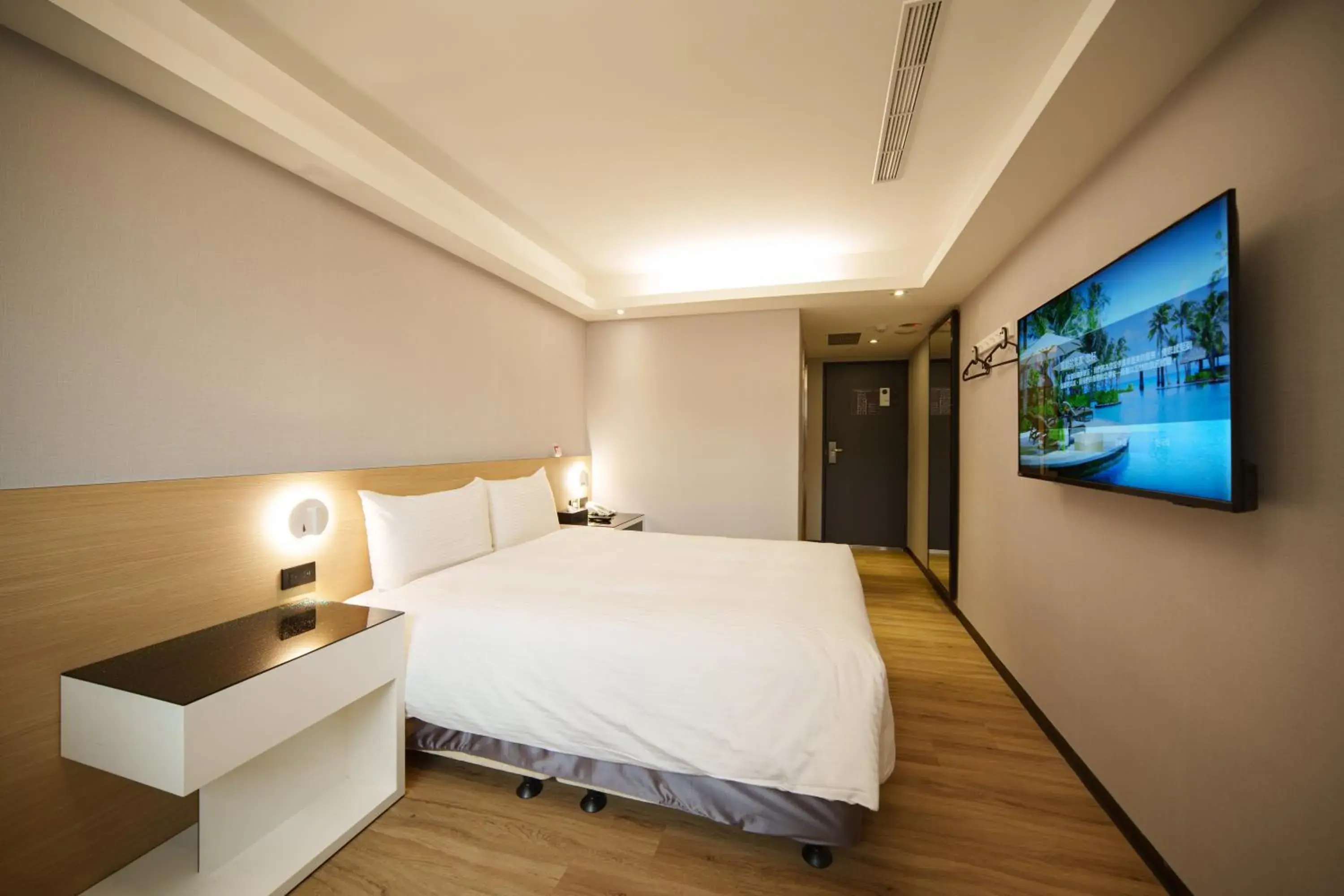 Bed in Hub Hotel Tucheng