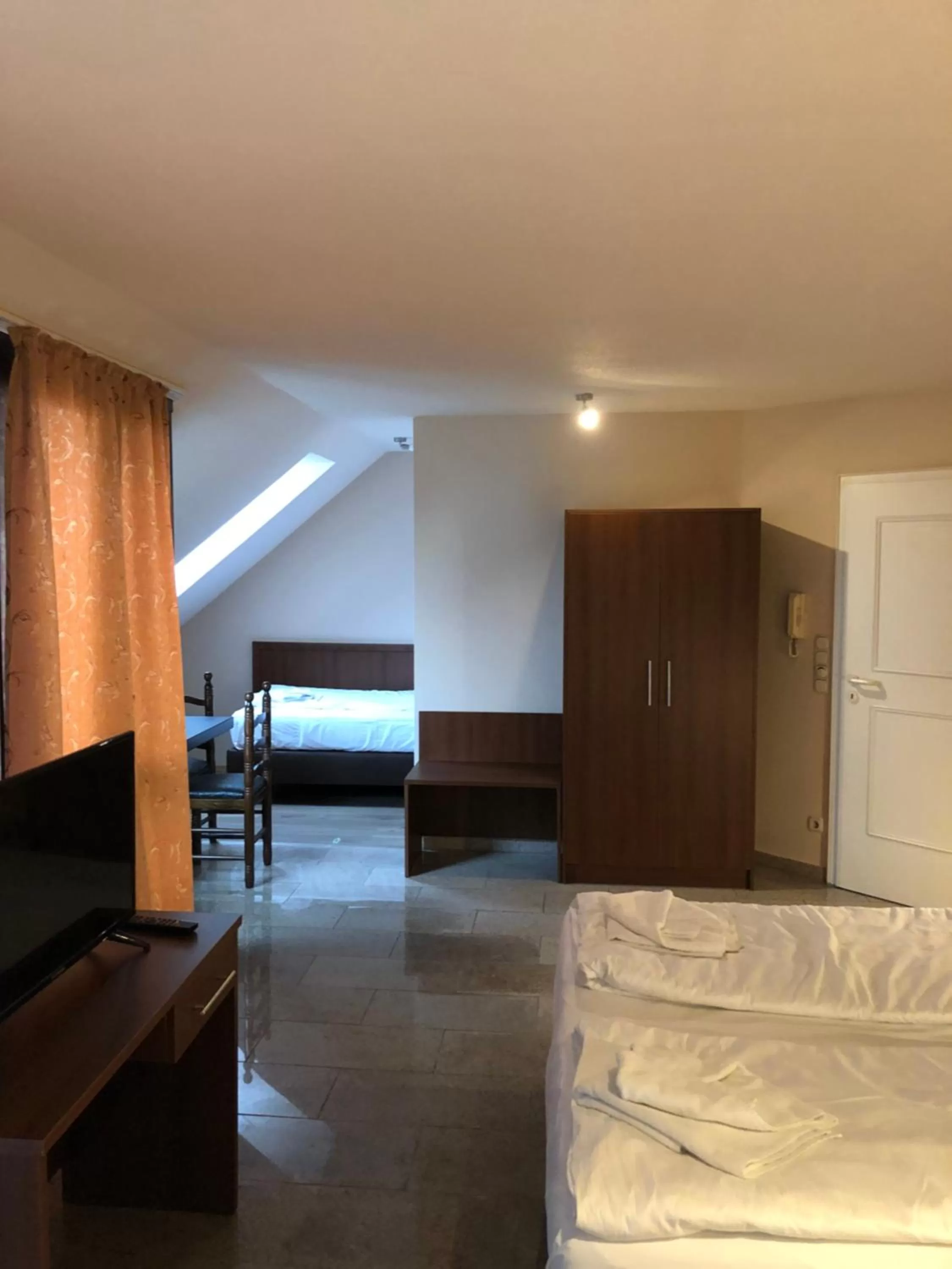 Bed in Hotel Poseidon