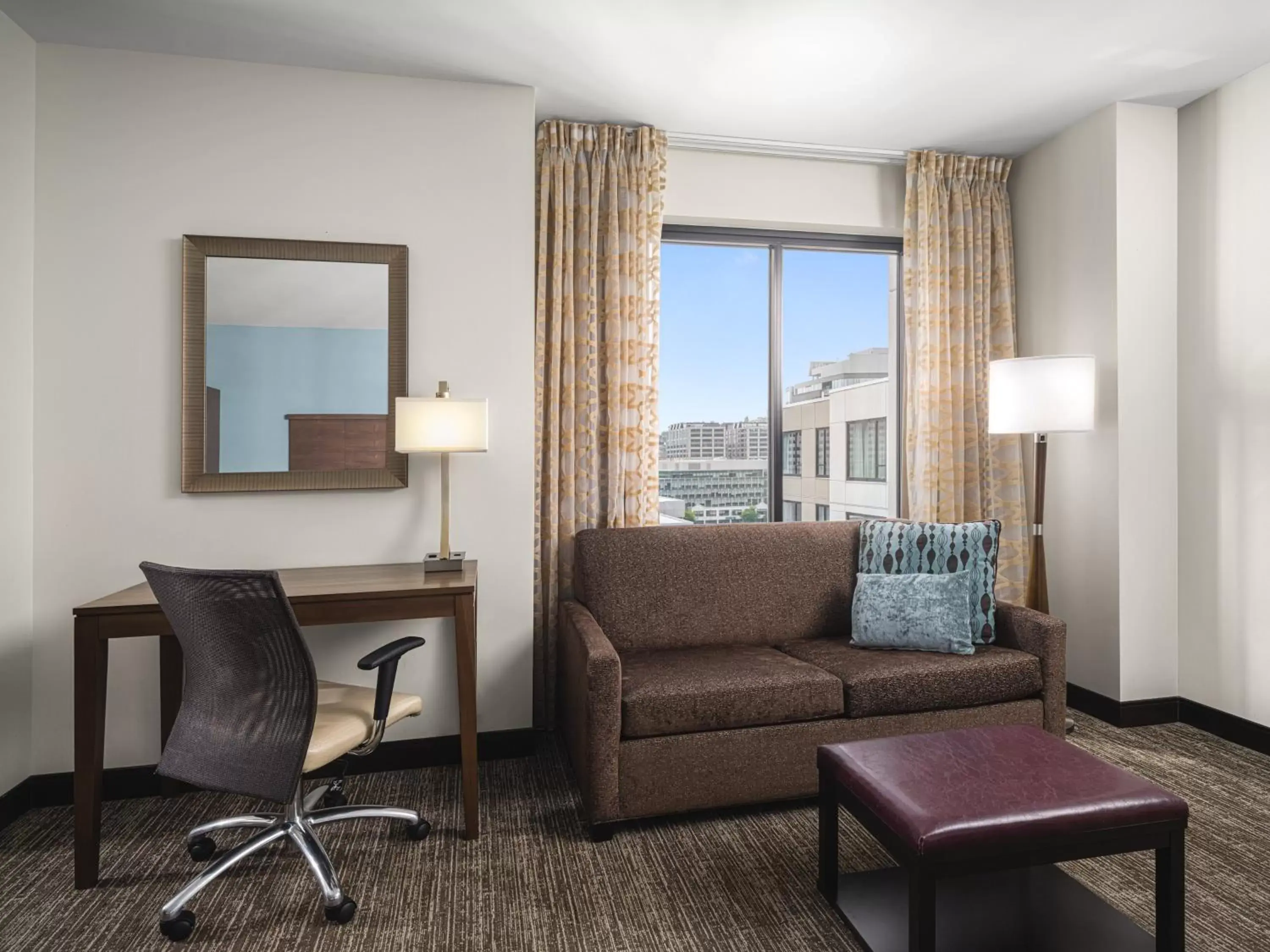 Bedroom, Seating Area in Staybridge Suites Seattle - South Lake Union, an IHG Hotel