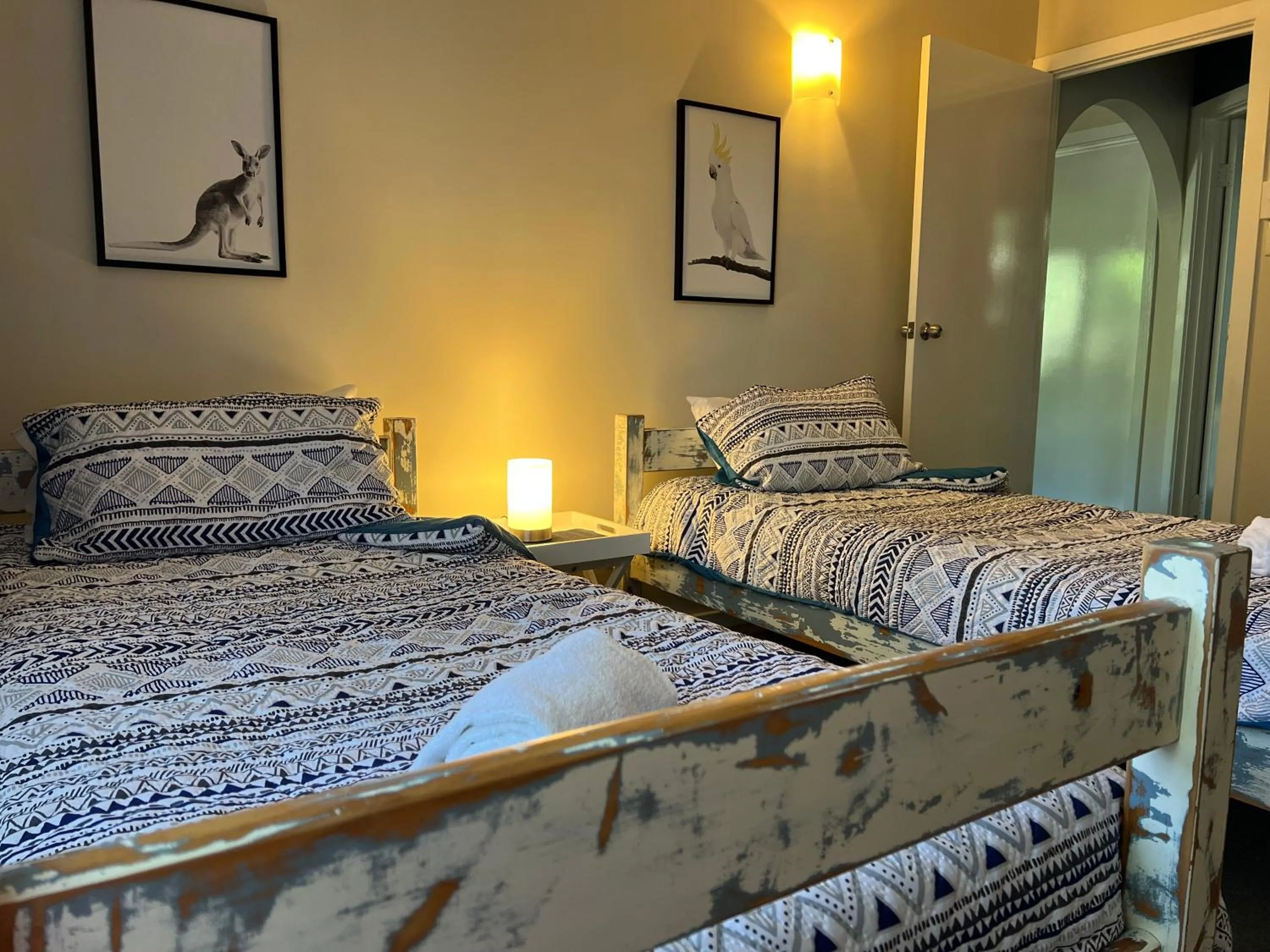 Bed in Colonial Village Resort