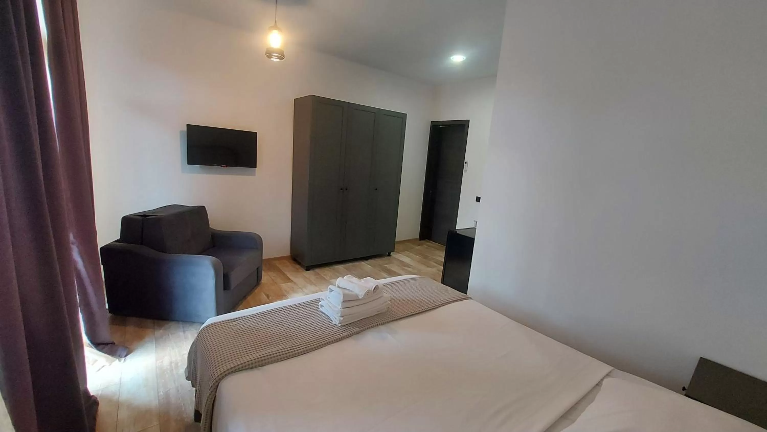 Triple Room with Bathroom in Level Up Hotel & Restaurant