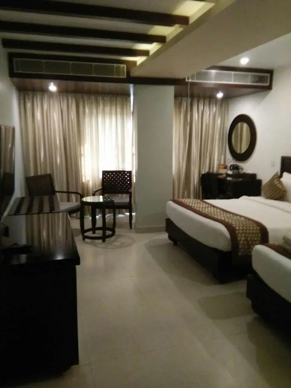 Bed in Pride Ananya Resort Puri