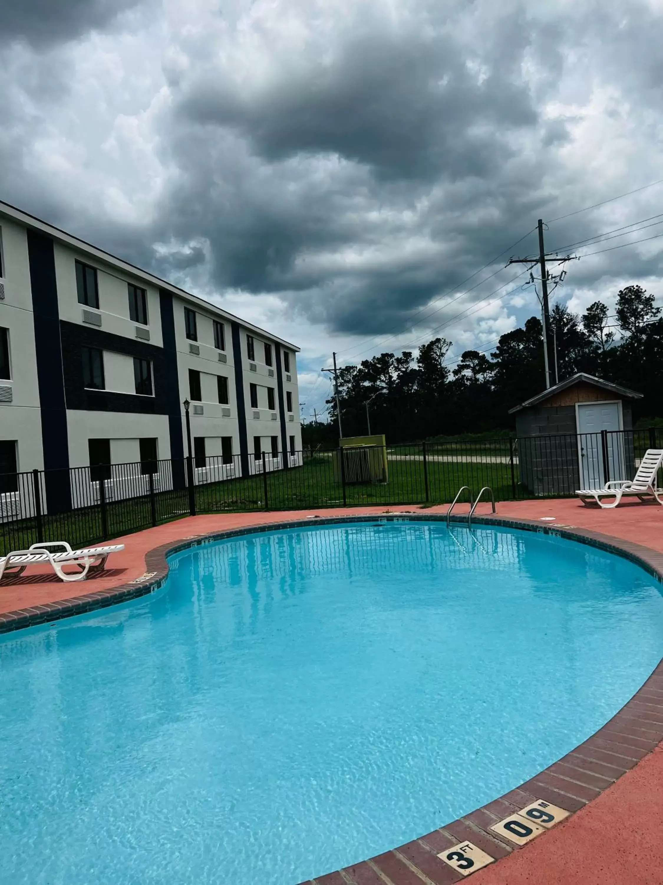 , Swimming Pool in Quality Inn & Suites Lake Charles