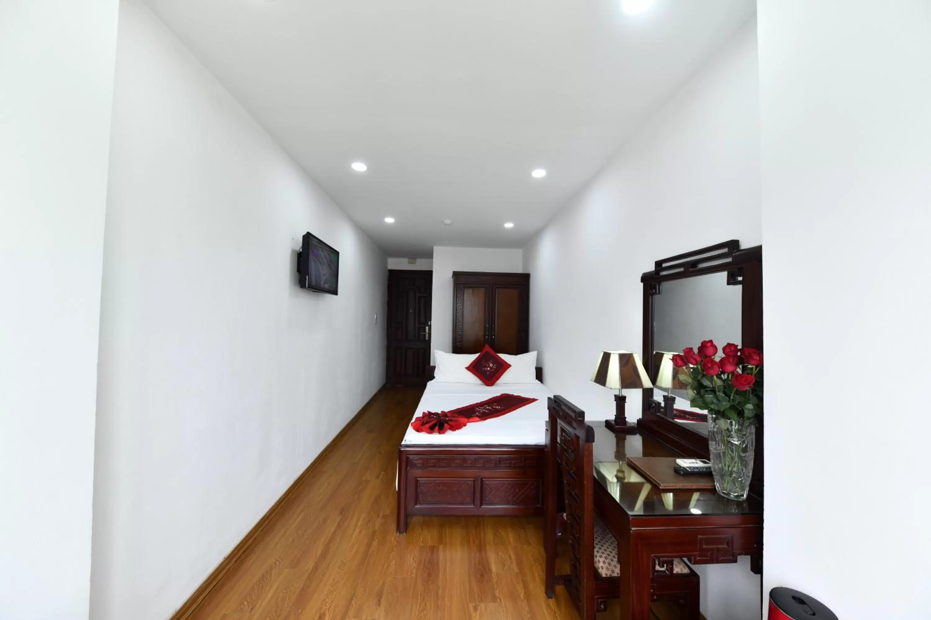 Bed in Phoenix Legend Hotel Hanoi