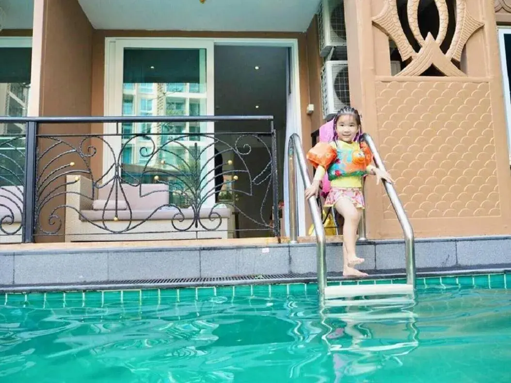 Children in Atlantic Condo Resort Pattaya by Panisara