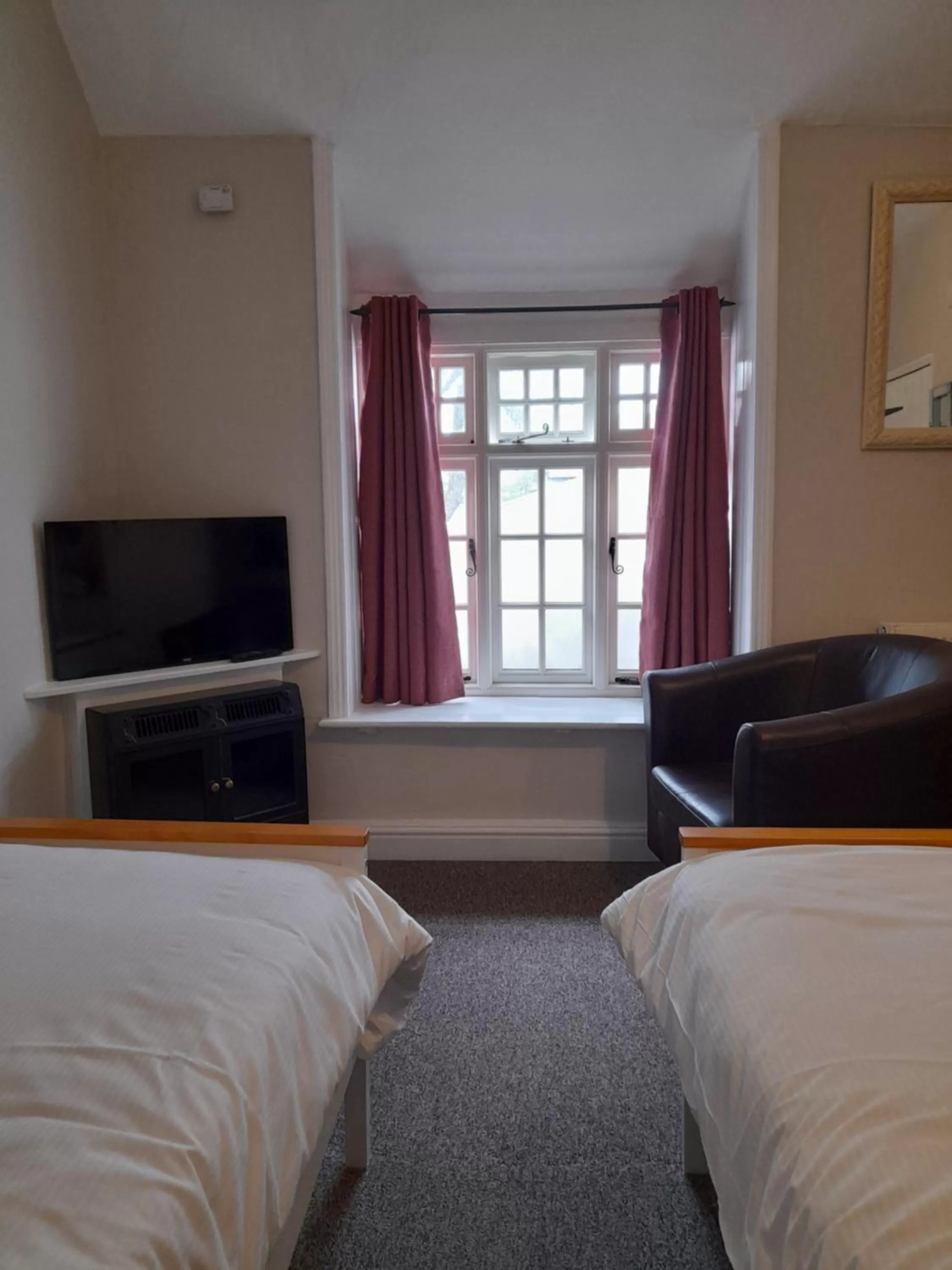 Bed in The Raven Inn