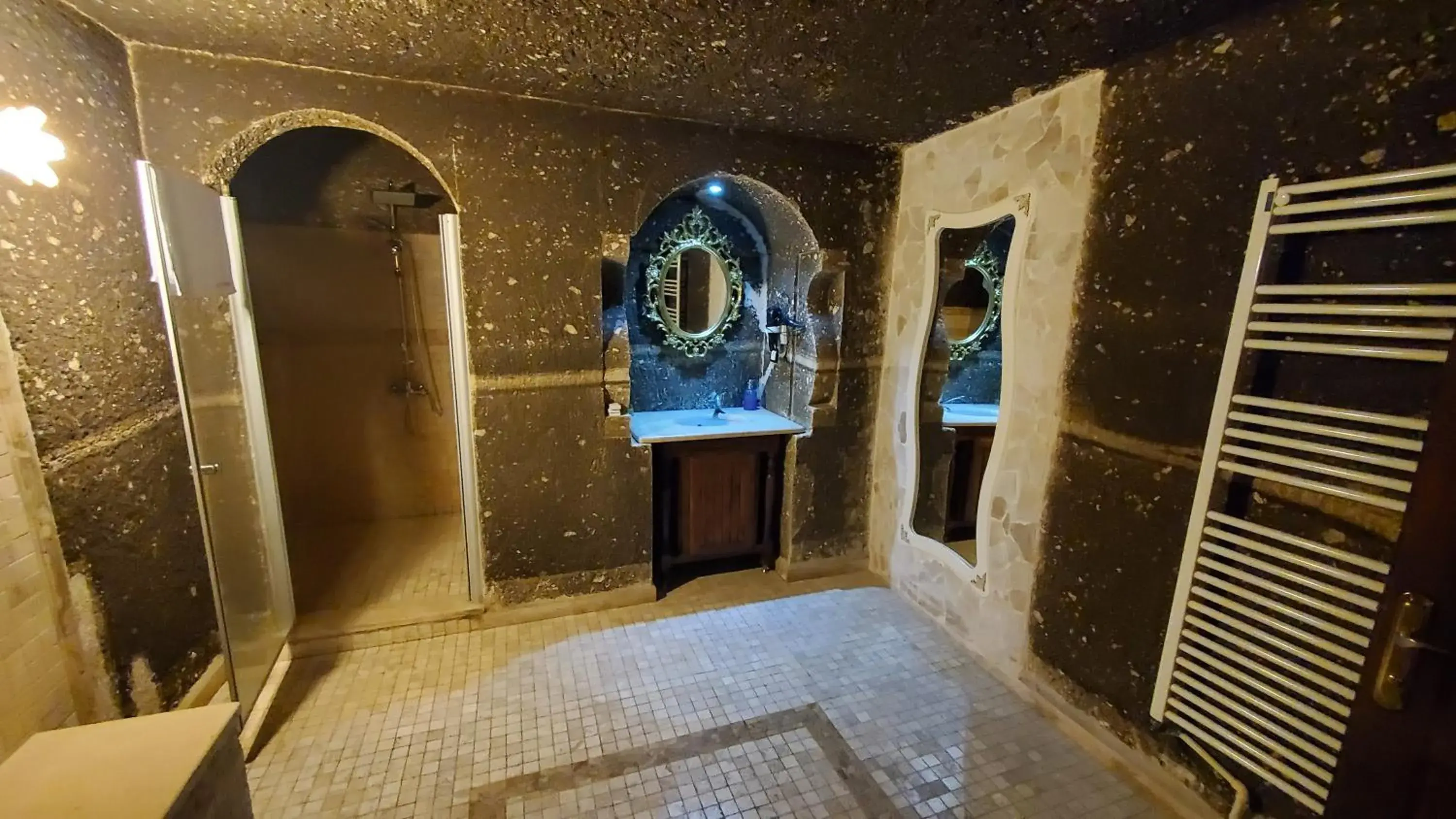 Shower, Bed in Antique Terrace Cave Suites Shower, Bed in Antique Terrace Cave Suites