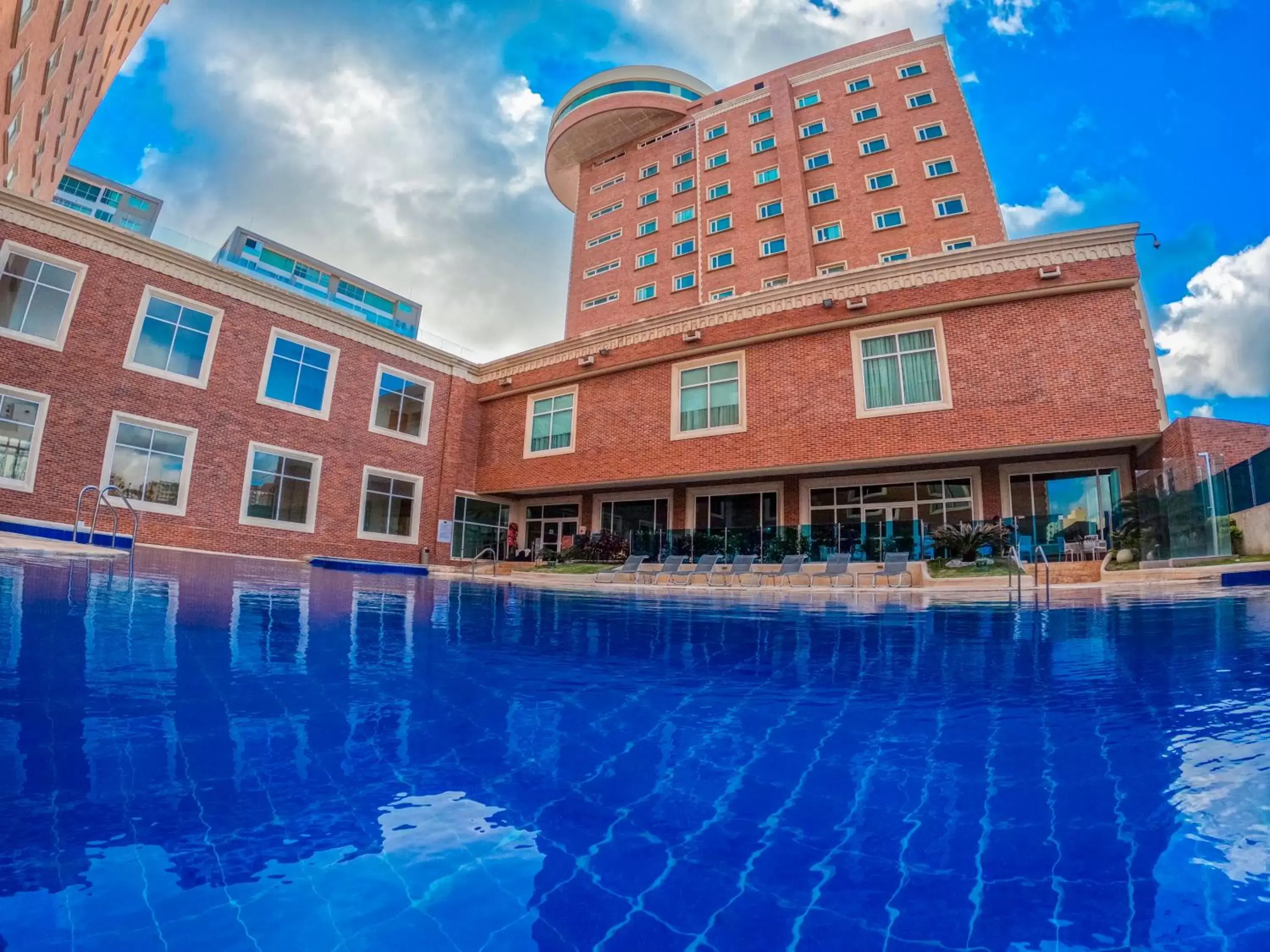 Property building, Swimming Pool in Hotel Dann Carlton Barranquilla y Centro de Convenciones