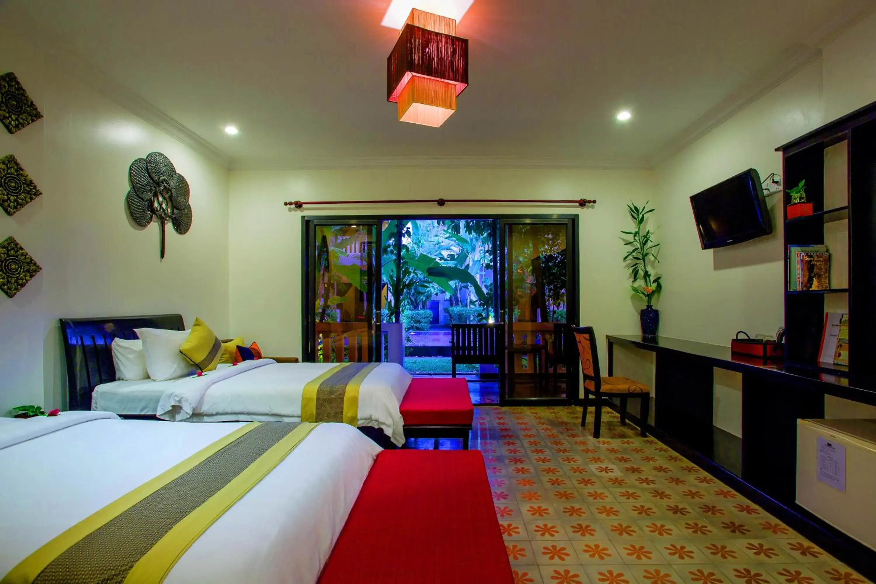 Bedroom in La Residence Watbo Hotel