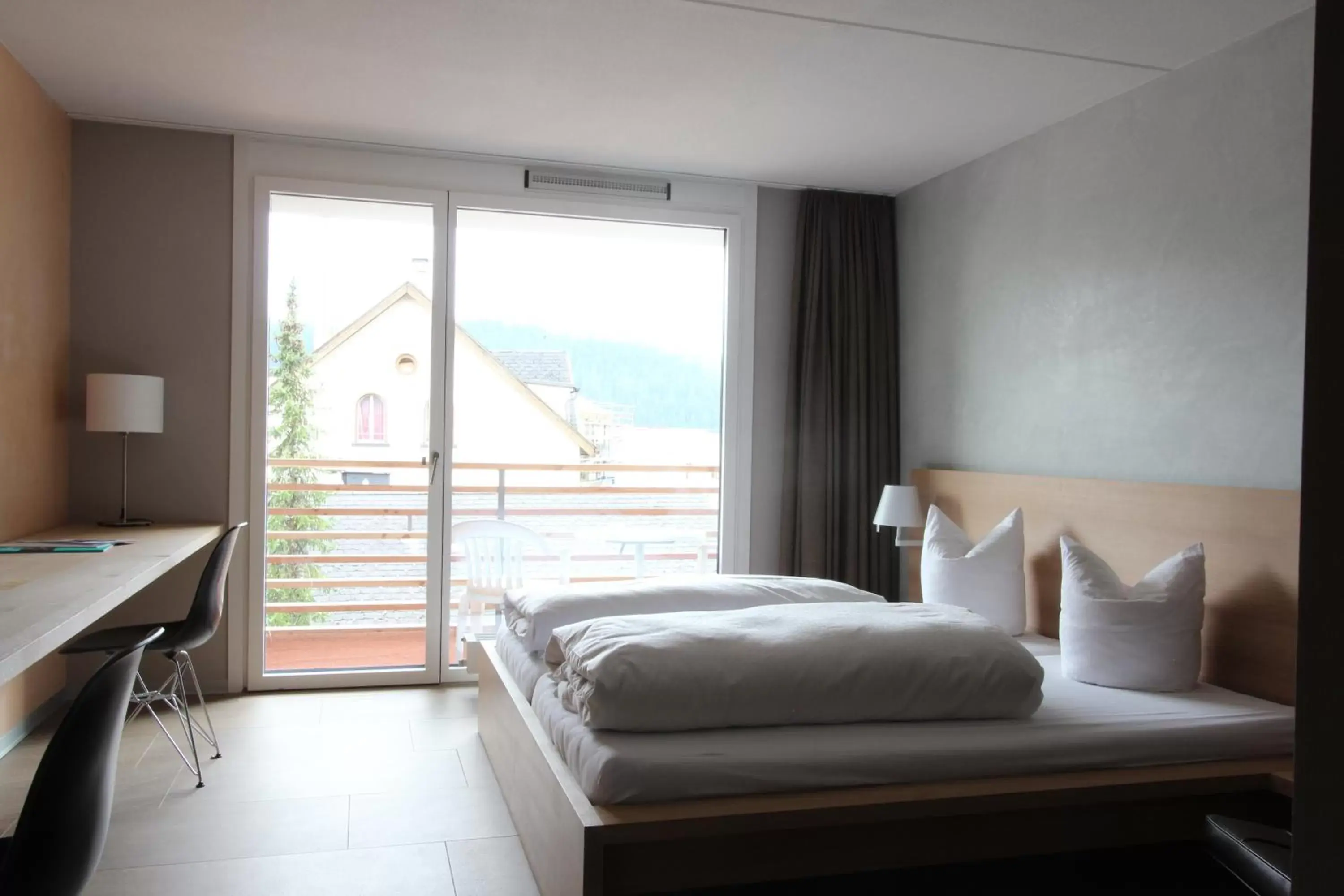 Bed in Hotel des Alpes