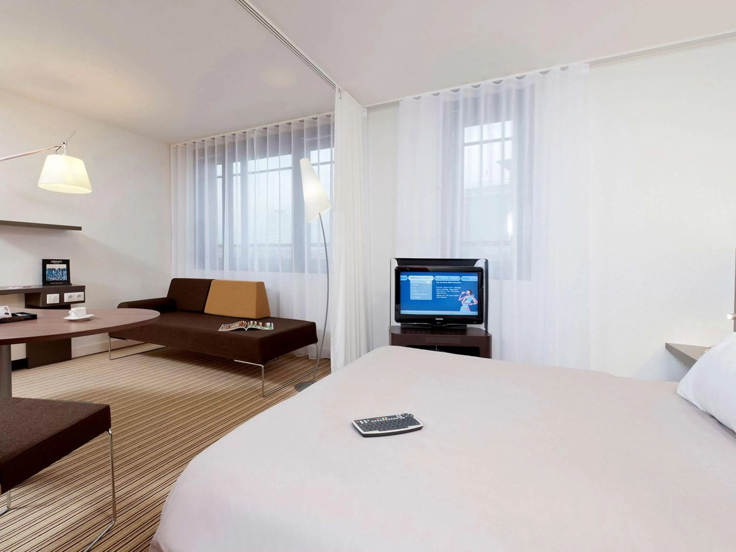 Photo of the whole room, Bed in Novotel Suites Lille Europe