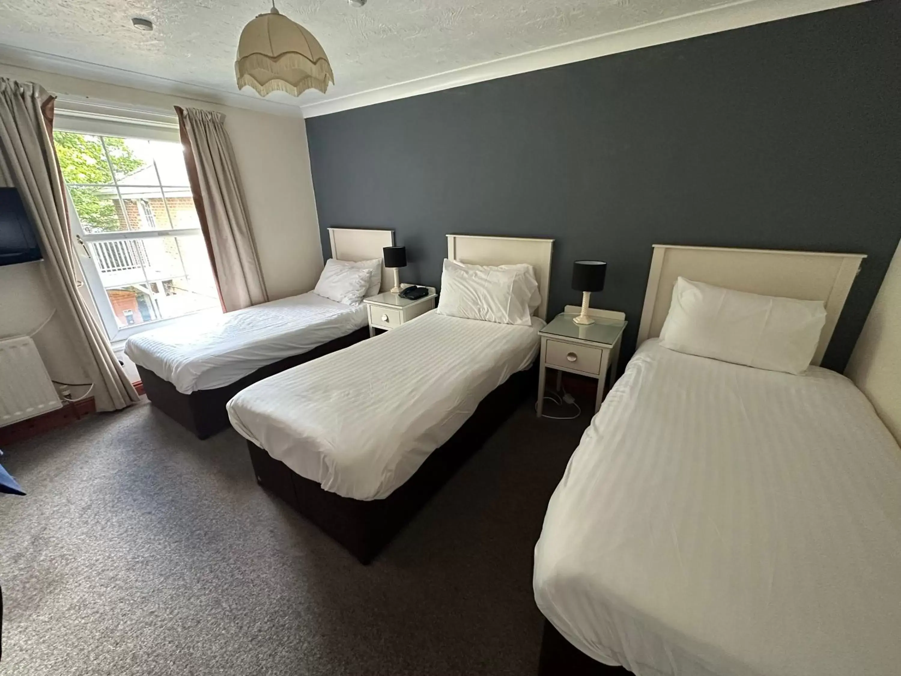 Triple Guest Room in The Gables Hotel Triple Guest Room in The Gables Hotel