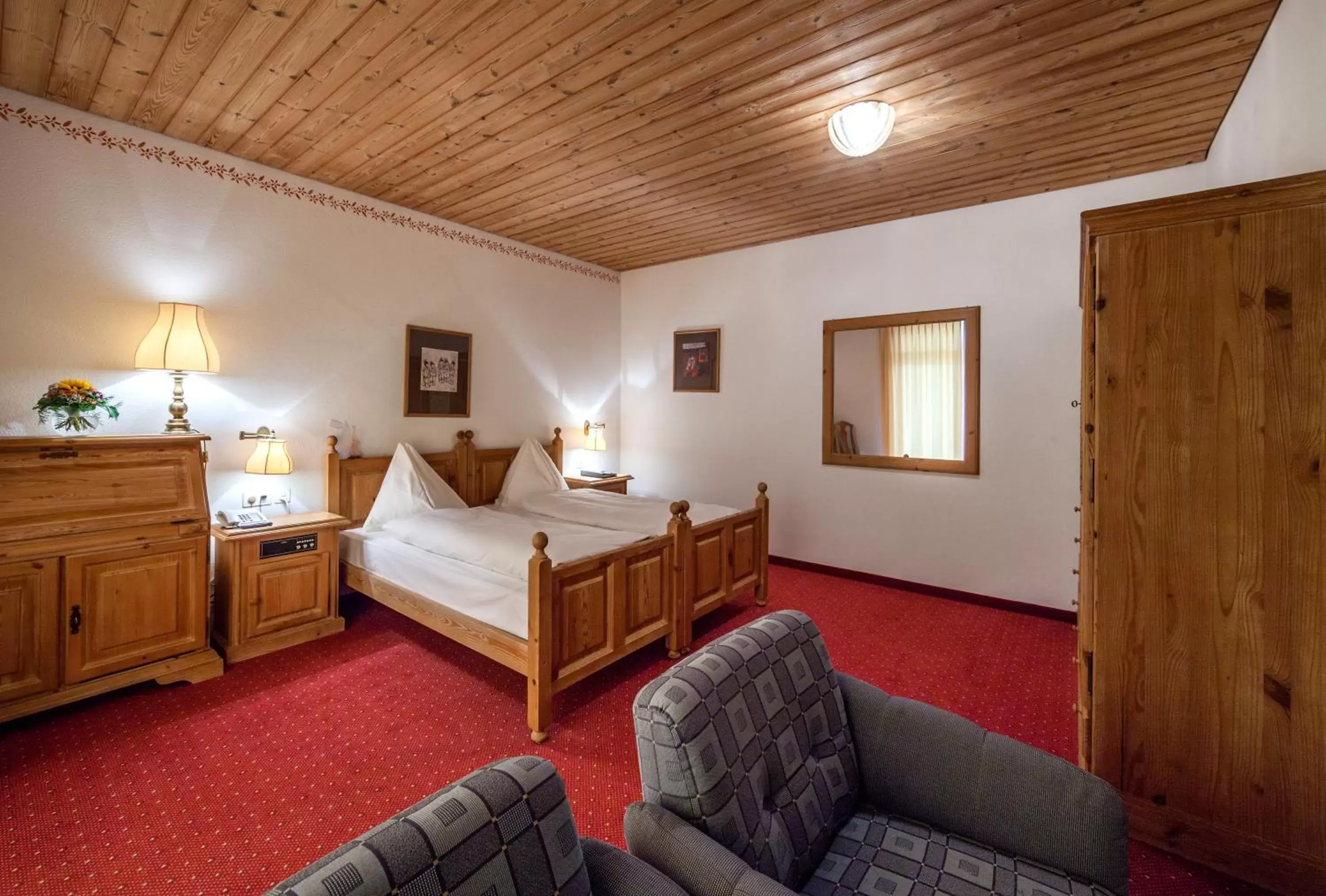 Photo of the whole room, Bed in Waldhotel Arosa