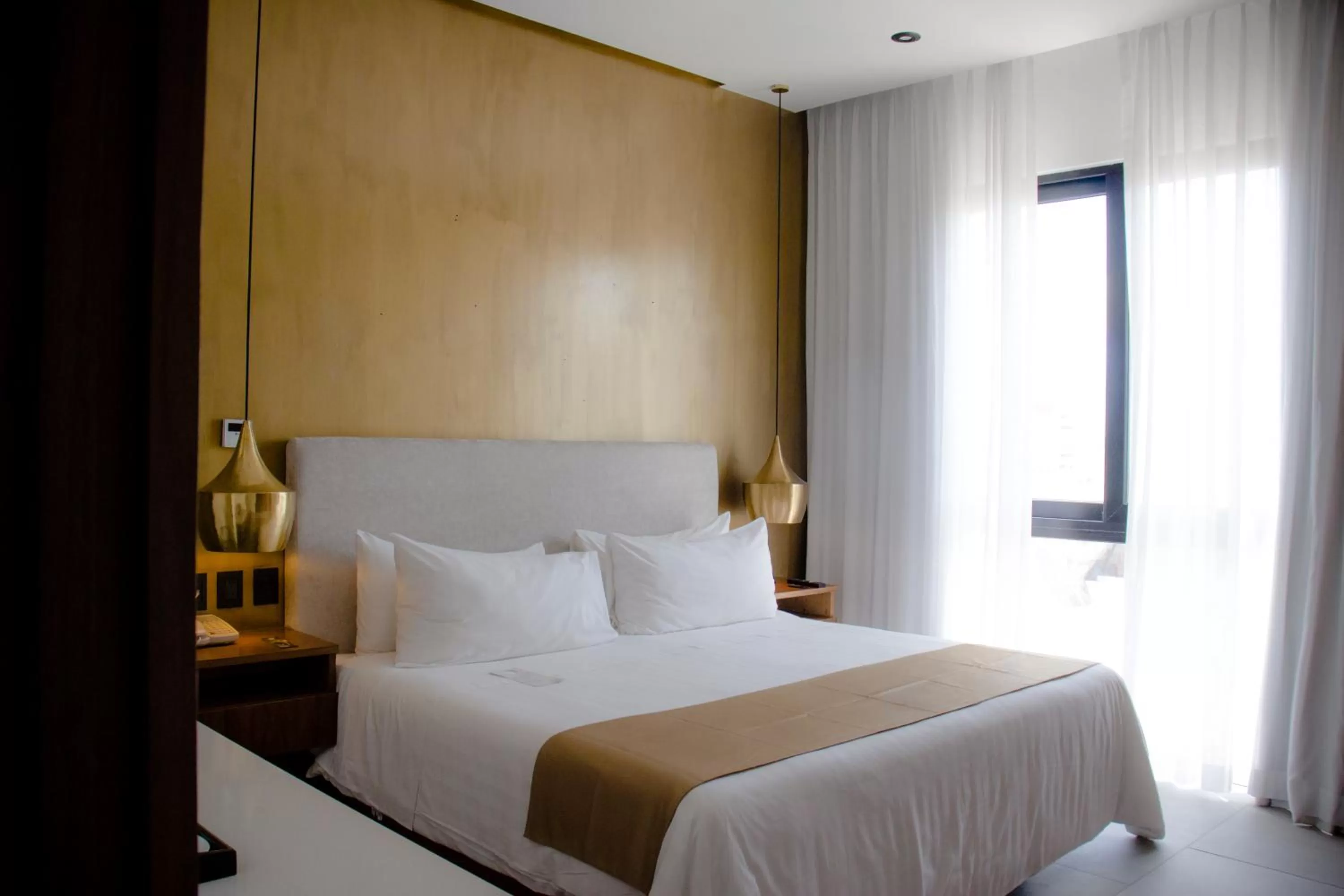 Bed in IT Boutique Hotel & Restaurant