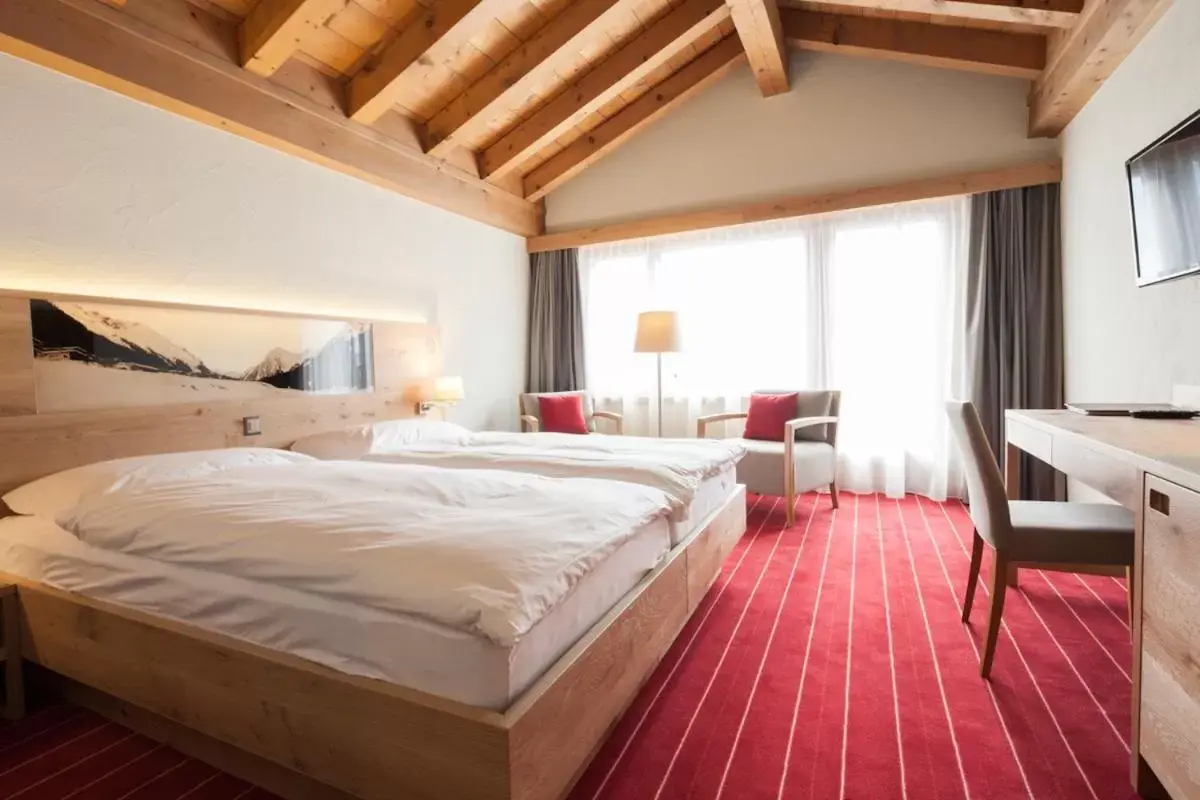 Photo of the whole room, Bed in Sunstar Hotel Klosters