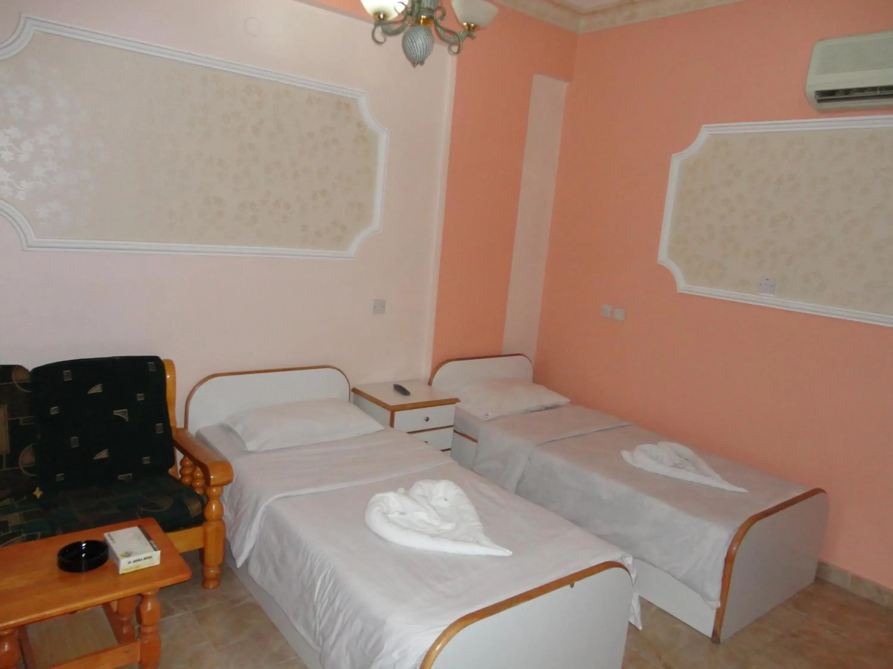 Bed in Al Qidra Hotel & Suites Aqaba
