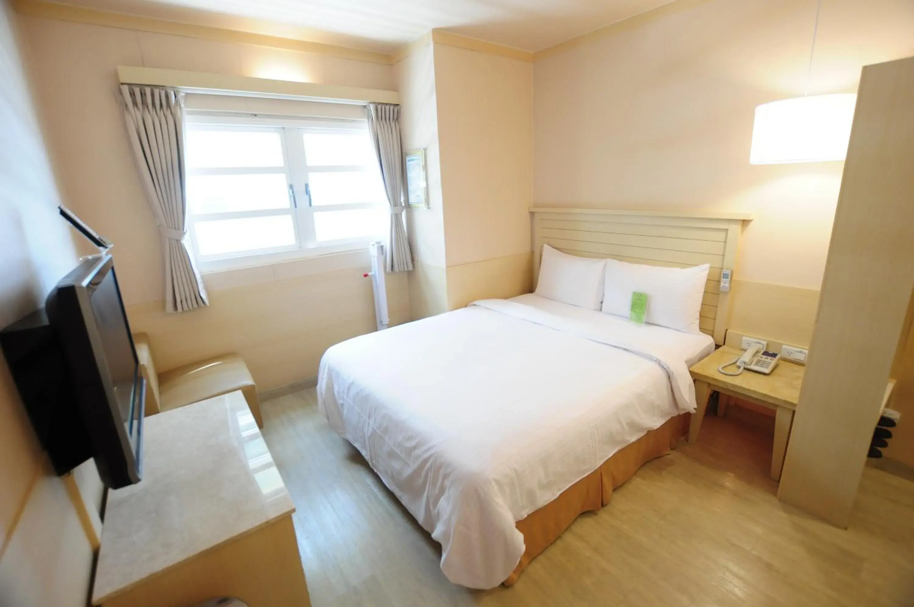 Bedroom in Kindness Hotel Min Sheng