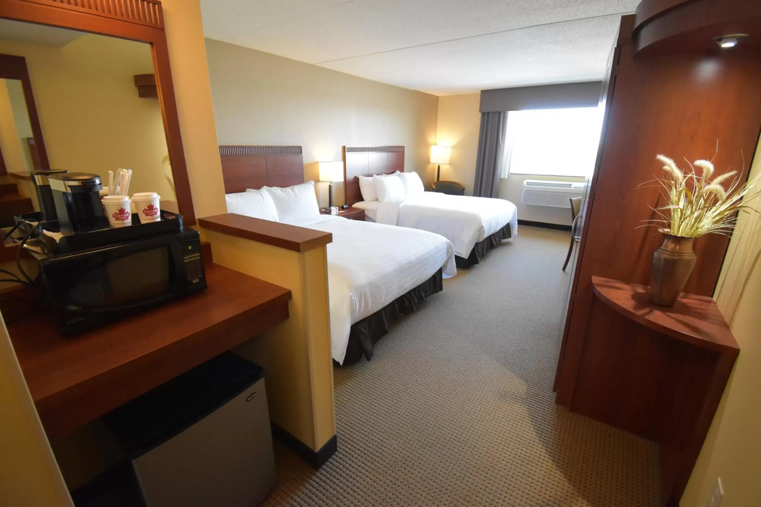 Queen Room with Two Queen Beds in Canad Inns Destination Center Grand Forks
