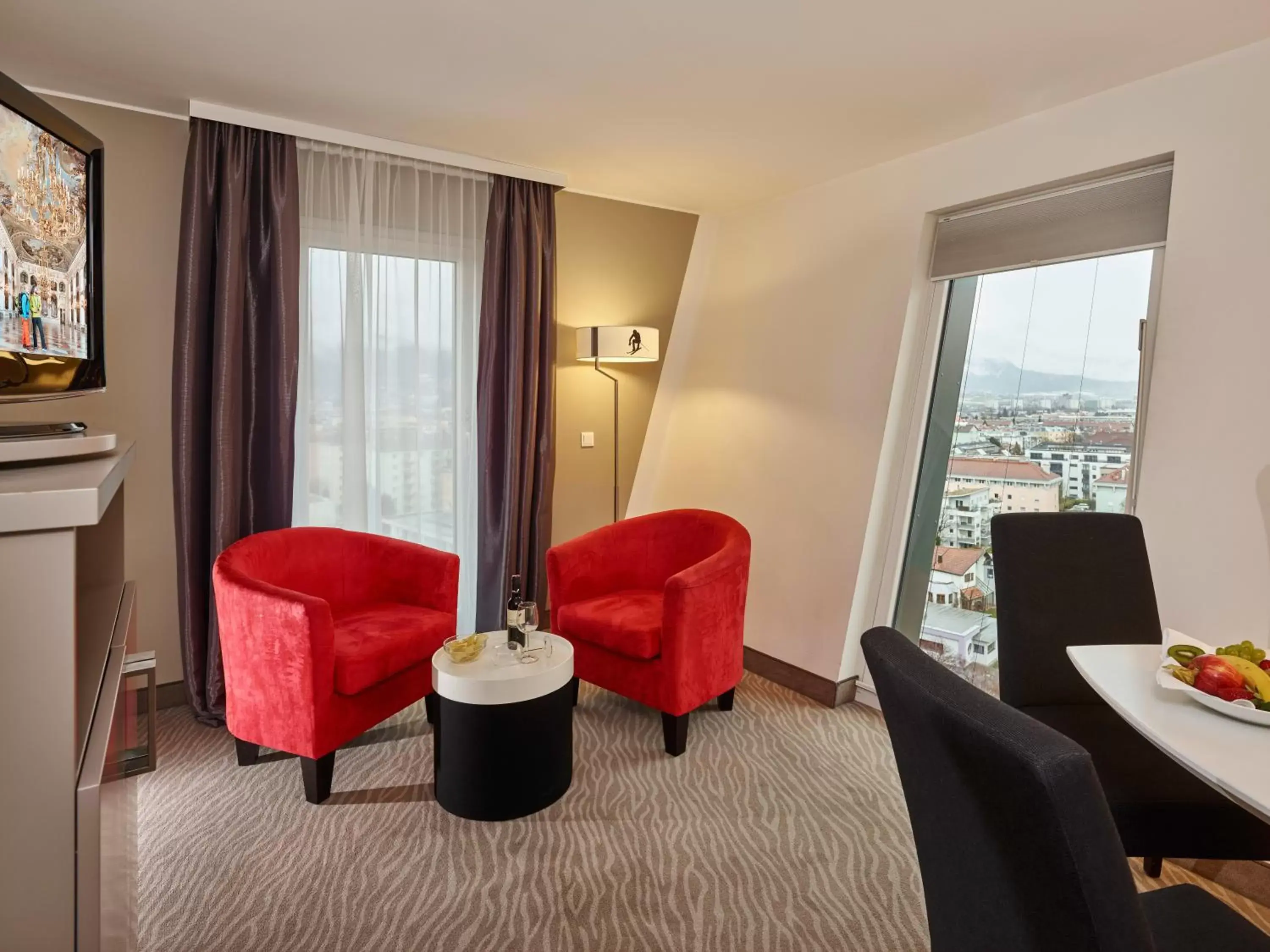 TV and multimedia, Seating Area in Tivoli Hotel Innsbruck