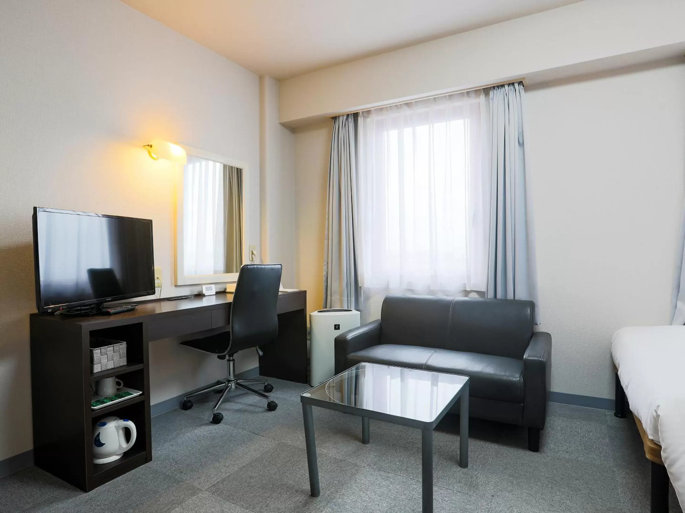 Photo of the whole room, Seating Area in Hotel Wing International Miyakonojo