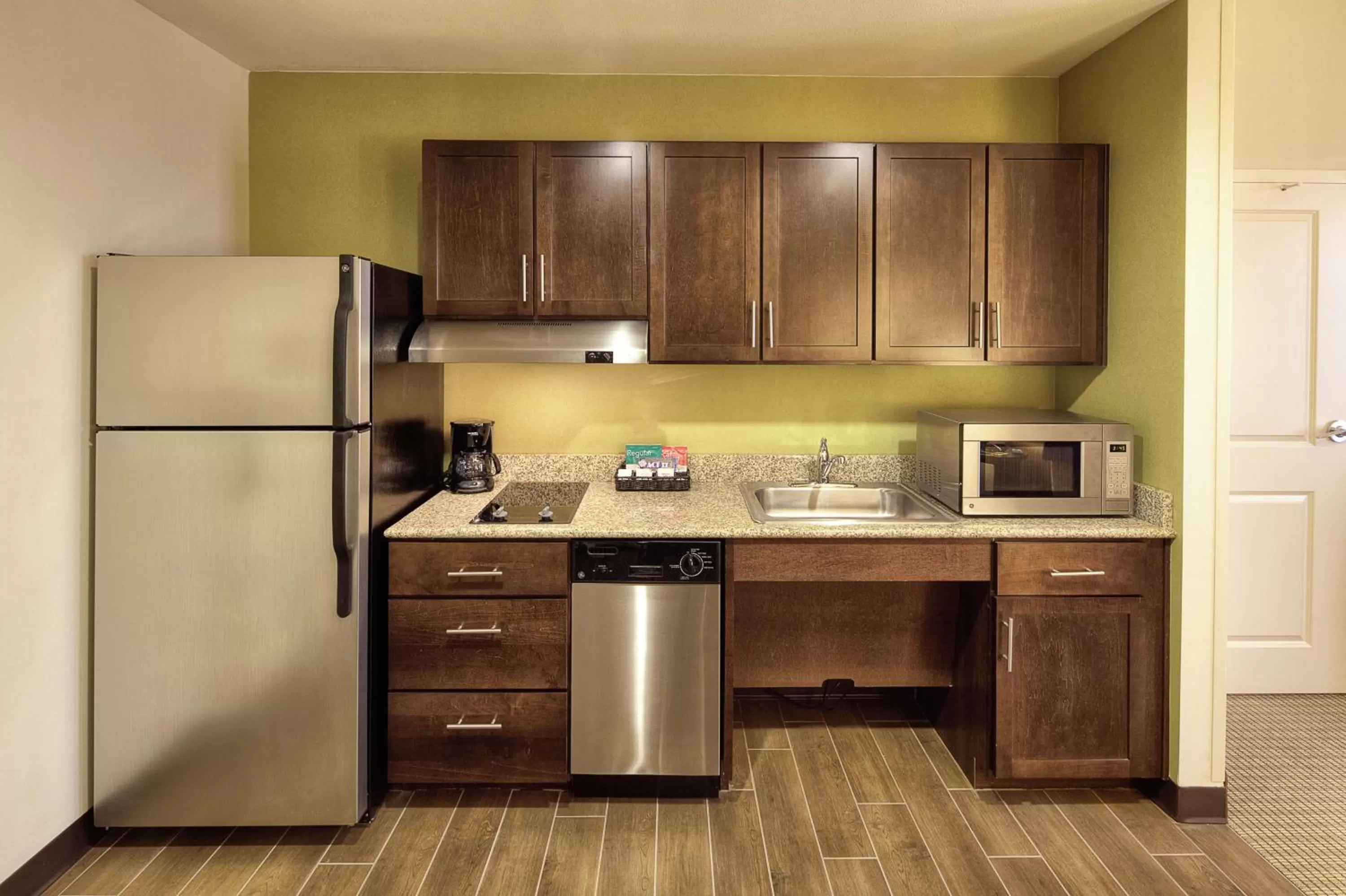 Kitchen or kitchenette in Homewood Suites by Hilton Victoria