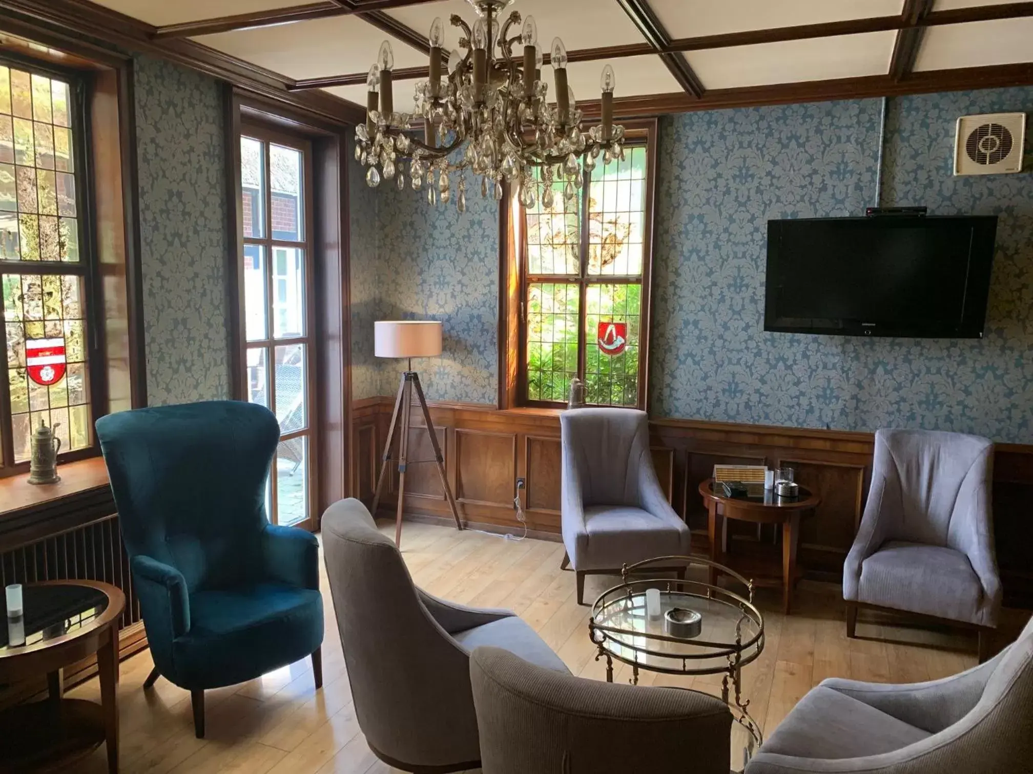 Communal lounge/ TV room, Seating Area in Hotel Landhaus Höpen