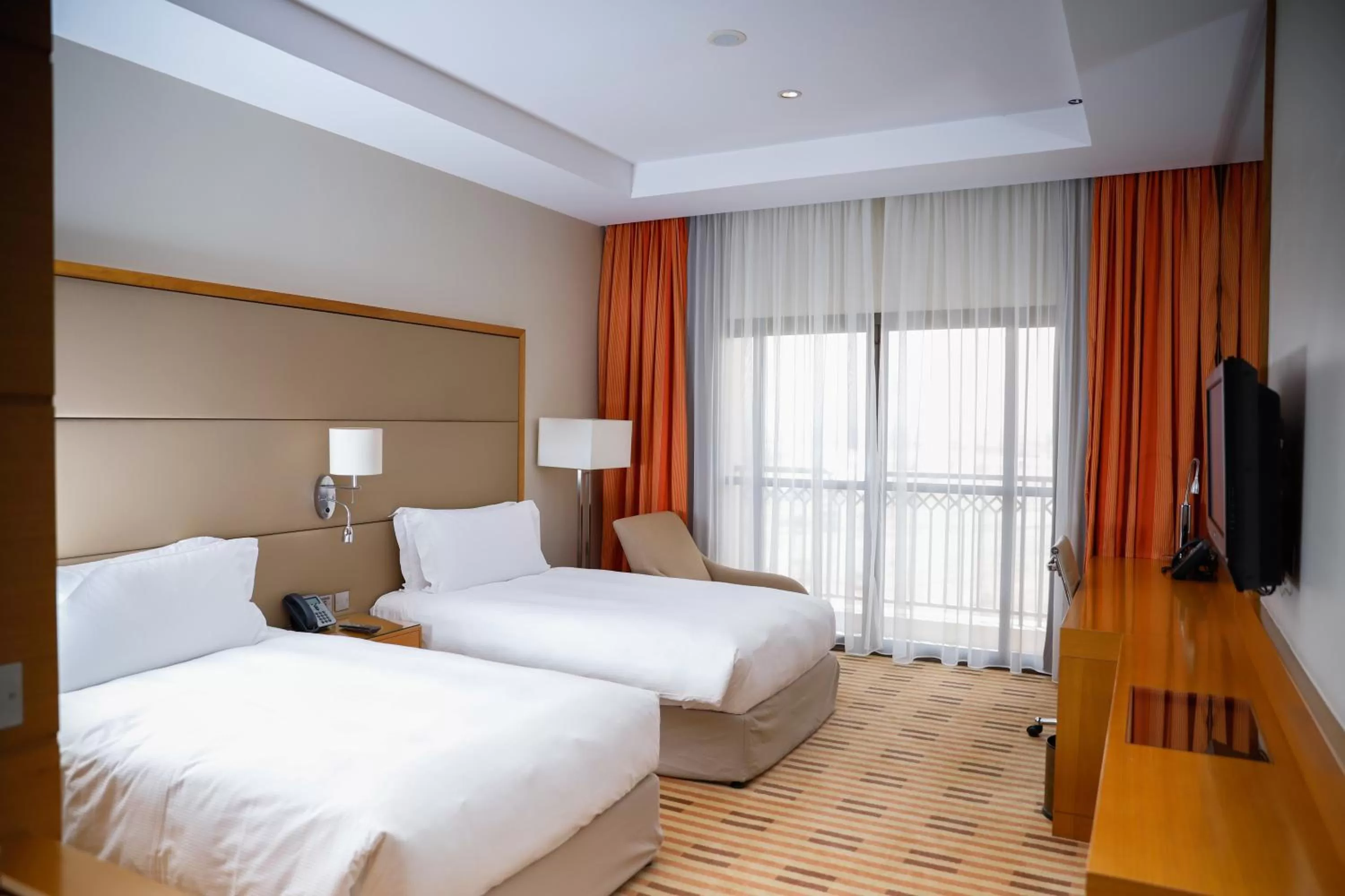 Photo of the whole room, Bed in Crowne Plaza Sohar by IHG